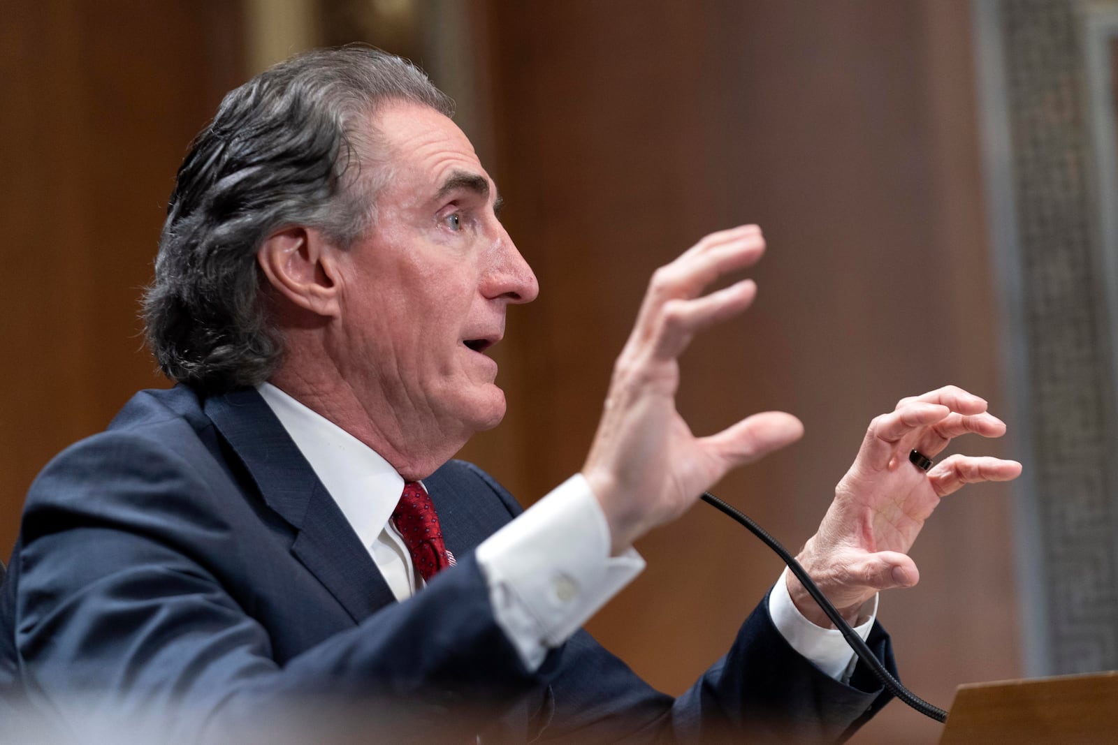 Former Gov. Doug Burgum, President-elect Donald Trump's choice to lead the the Interior Department as Secretary of the Interior, testifies before the Senate Energy and Natural Resources Committee on Capitol Hill in Washington, Thursday, Jan. 16, 2025. (AP Photo/Jose Luis Magana)