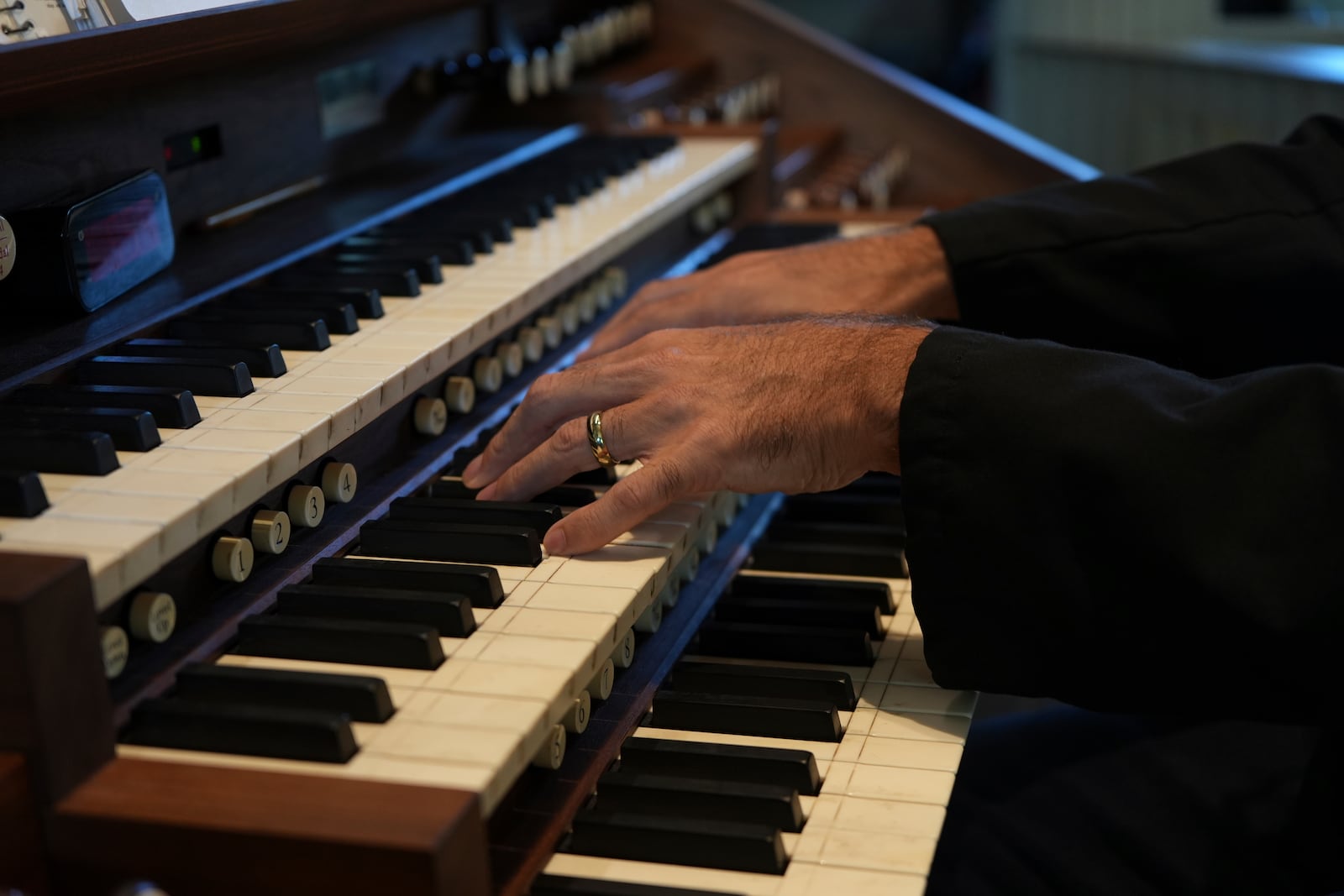 Christ Church’s Director of Music Parker Kitterman plays the organ during a service in Philadelphia on Sunday, Oct. 6, 2024. (AP Photo/Luis Andres Henao)