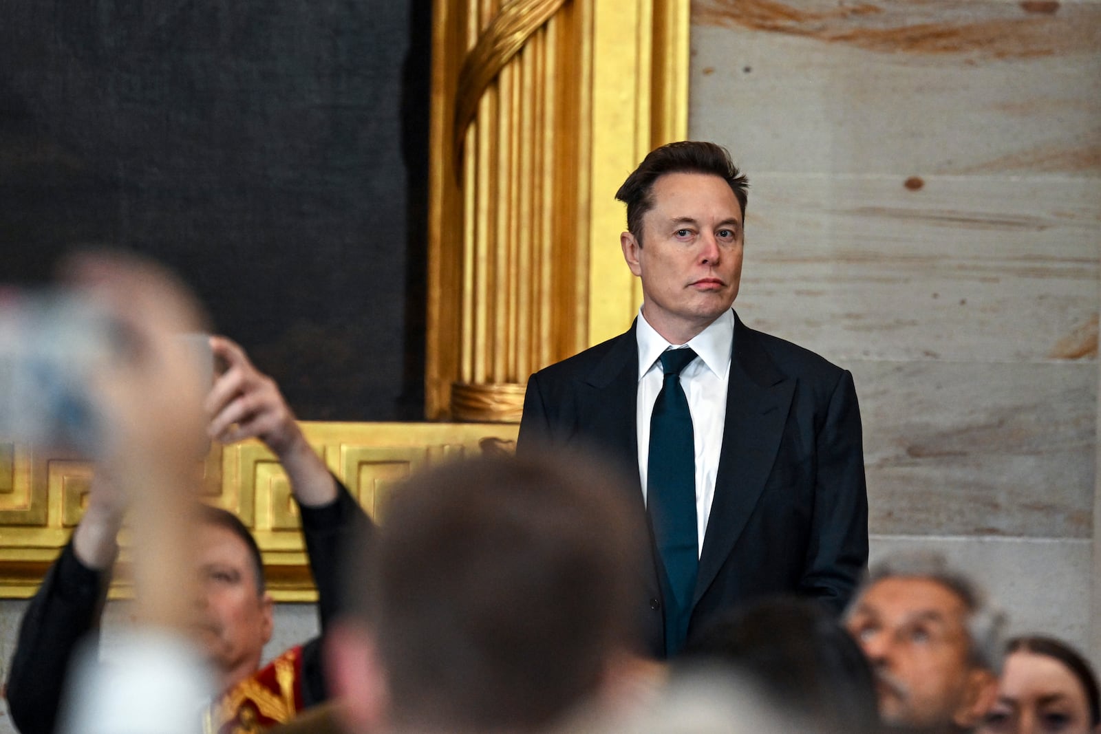 Elon Musk arrives before the 60th Presidential Inauguration in the Rotunda of the U.S. Capitol in Washington, Monday, Jan. 20, 2025. (Kenny Holston/The New York Times via AP, Pool)