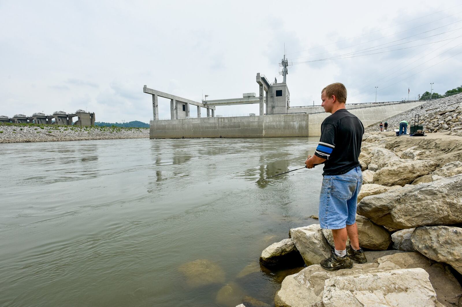 The city of Hamilton owns three hydroelectric power plants, including the 105-megawatt Meldahl Hydroelectric Plant near Foster, Ky., where Brandon Blackburn, 17, fished during its 2016 dedication ceremony. 