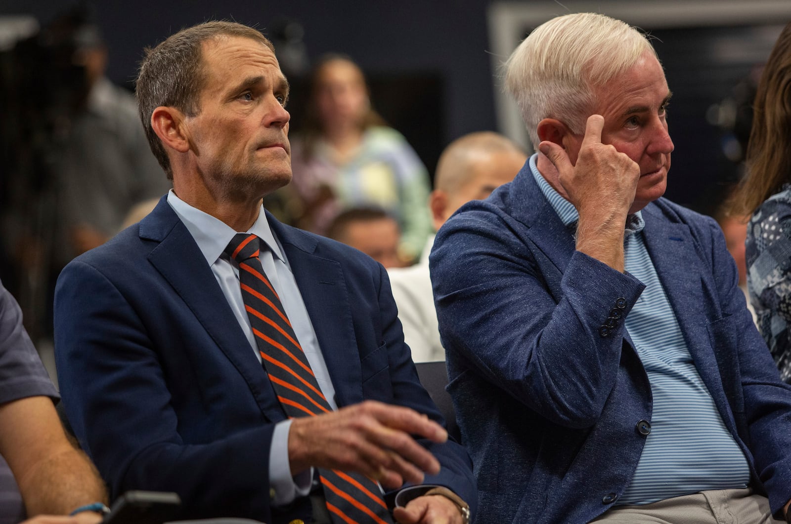 University of Virginia President Jim Ryan, left, and Robert Hardie, Rector of the school's Board of Visitors, attend a press conference where Virginia NCAA college basketball coach Tony Bennett announced his retirement in Charlottesville, Va., Friday, Oct. 18, 2024. (Cal Cary/The Daily Progress via AP)