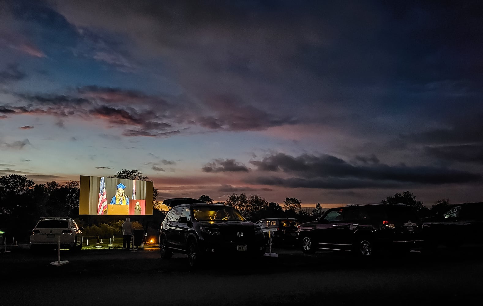 Hamilton High School seniors celebrate graduation at Holiday Auto Theatre drive-in