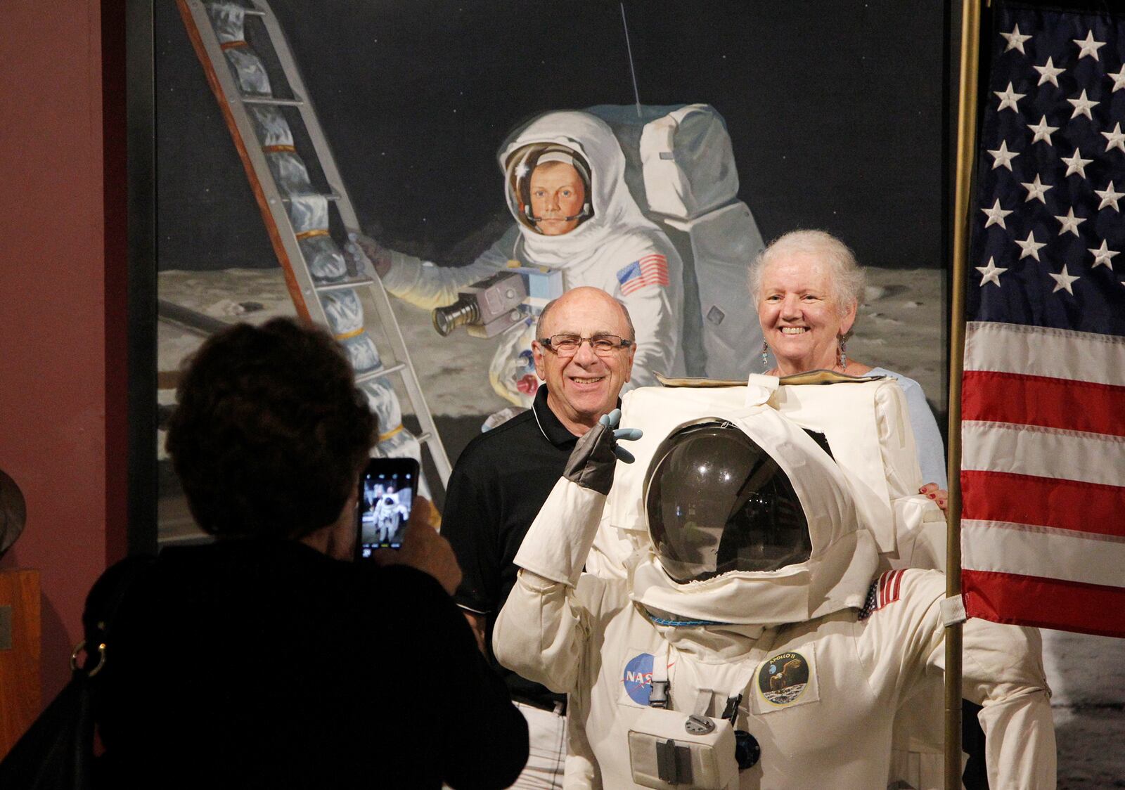 Visitors pose for a photograph at the Armstrong Air & Space Museum in Wapakoneta. July 20 is the 50th anniversary of the Apollo 11 mission and native son, Neil Armstrong was the first to step foot on the moon. LISA POWELL / STAFF