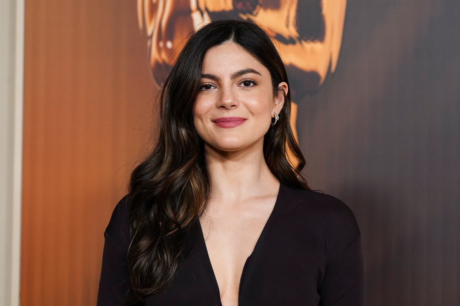 Monica Barbaro arrives at the Oscars Nominees Dinner on Tuesday, Feb. 25, 2025, at the Academy Museum of Motion Pictures in Los Angeles. (Photo by Jordan Strauss/Invision/AP)