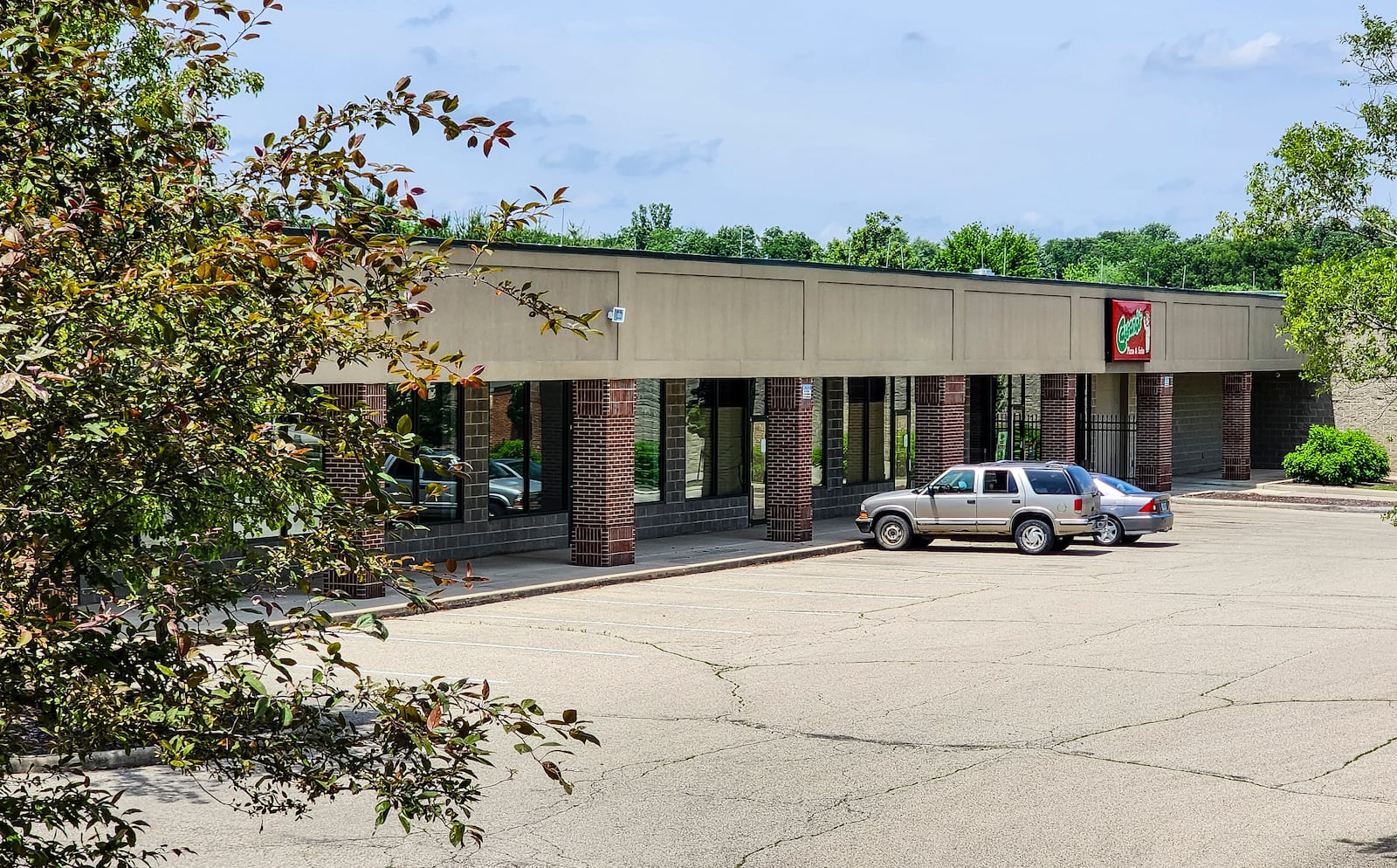 The strip center adjacent to the Monroe Police department is mostly vacant with Cassano's Pizza being one of the only businesses in the building. NICK GRAHAM/STAFF