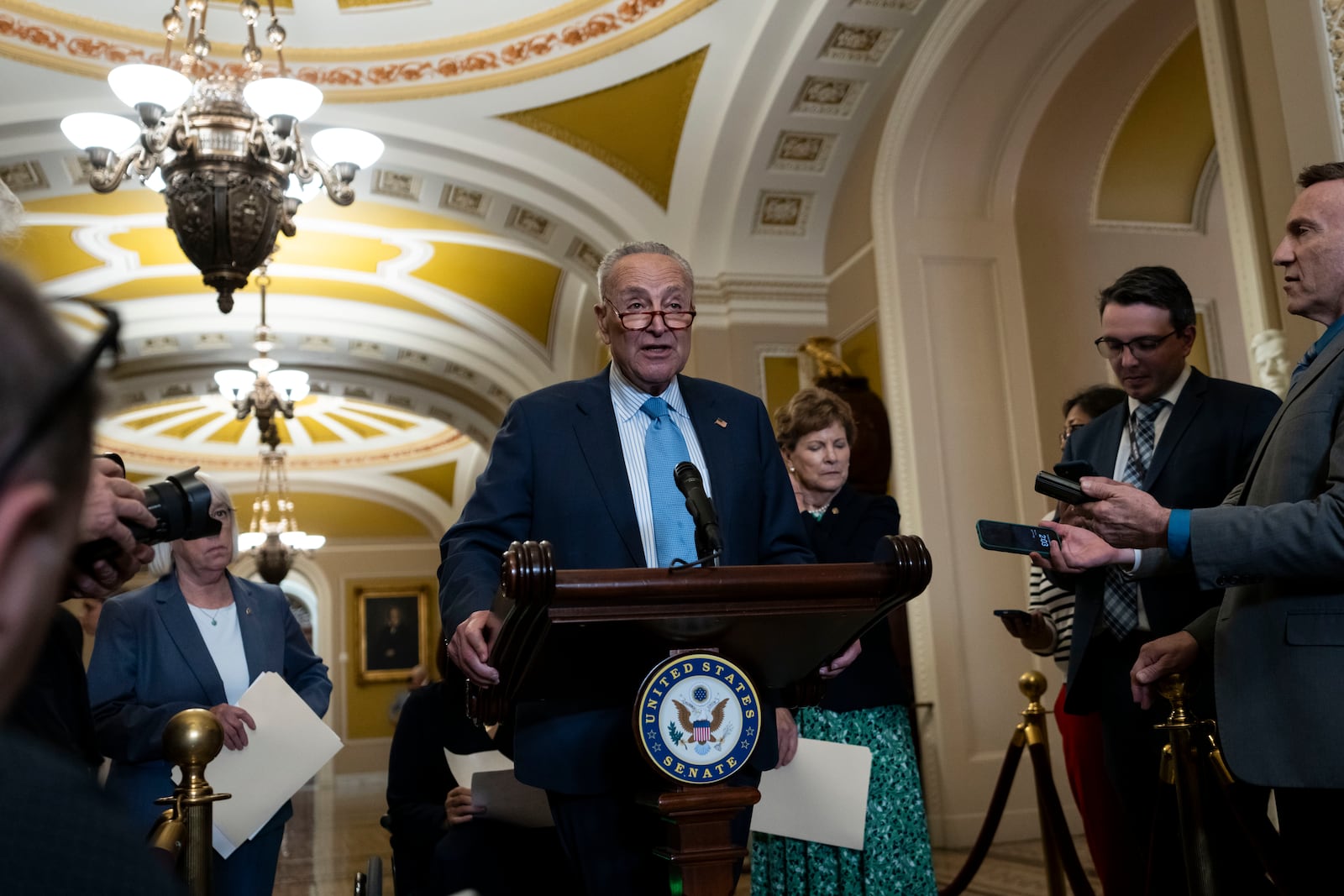 Senate Majority Leader Chuck Schumer, D-NY, speaks to the media following the Senate Democratic Party policy luncheon at Capitol Hill in Washington, Tuesday, Sept. 17, 2024. (AP Photo/Ben Curtis)