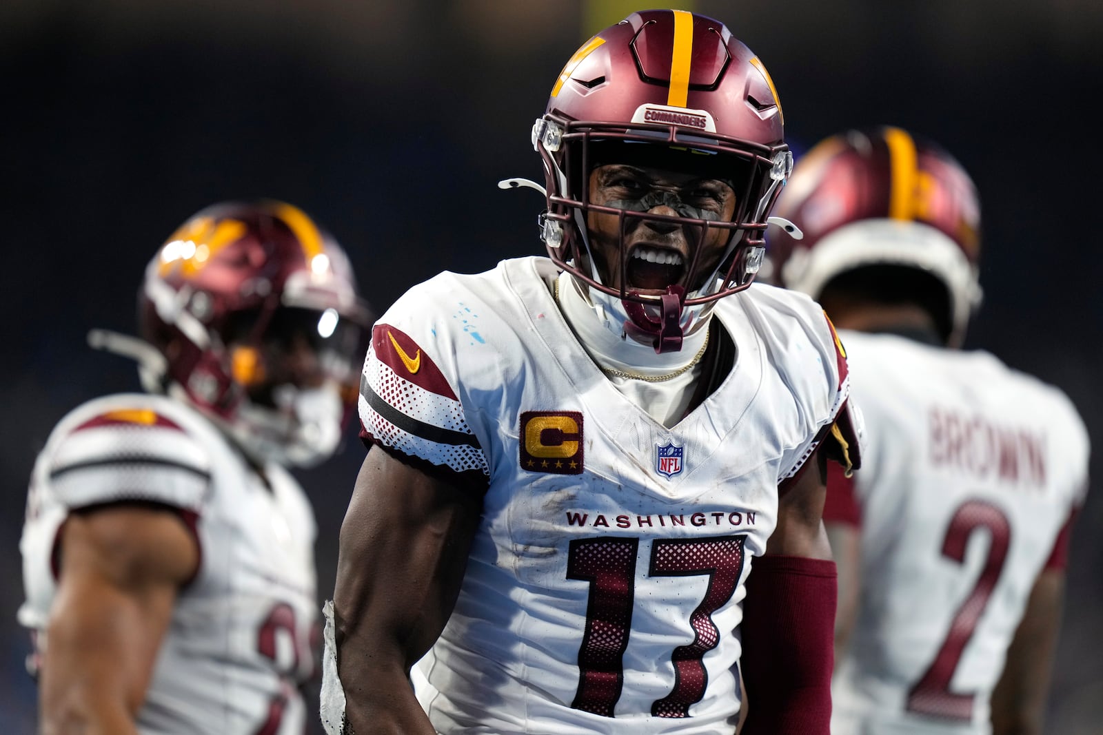 Washington Commanders wide receiver Terry McLaurin (17) reacts to a reception against the Detroit Lions during the second half of an NFL football divisional playoff game, Saturday, Jan. 18, 2025, in Detroit. (AP Photo/Seth Wenig)