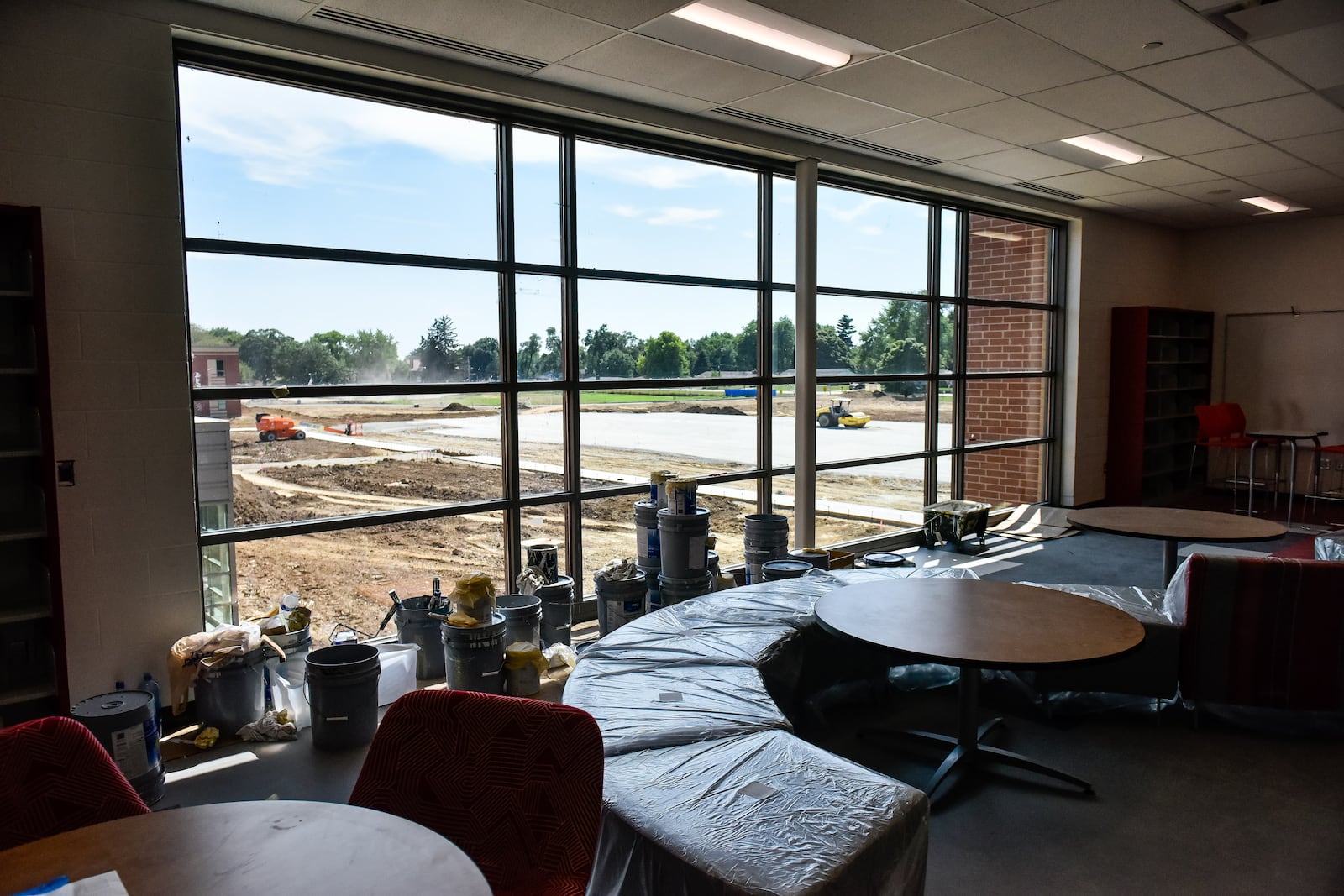 Construction continues on the new $49 million Carlisle school for grades pre-k through 12 Wednesday, July 30, 2020. The school is divided into sections for high school, middle school and elementary school and will consolidate four schools into one building.  NICK GRAHAM / STAFF