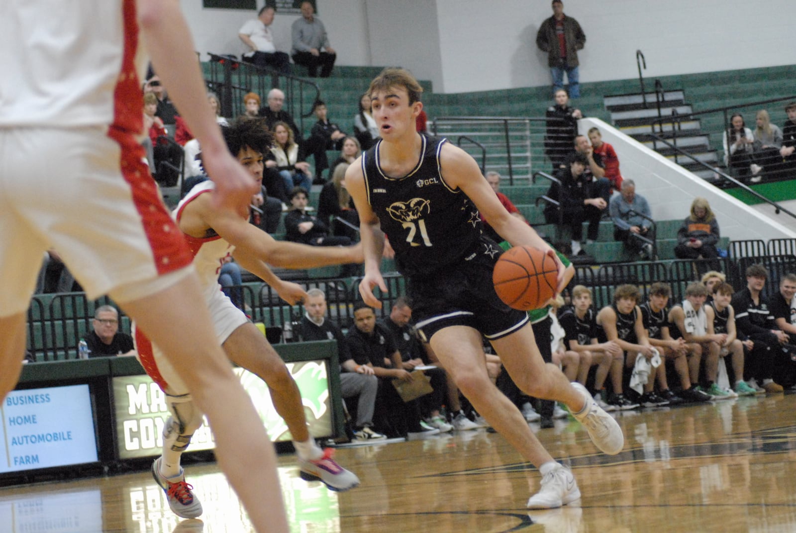 Badin's Grant Wissman (21) drives past a couple Indian Hill defenders on Saturday at Mason. Chris Vogt/CONTRIBUTED