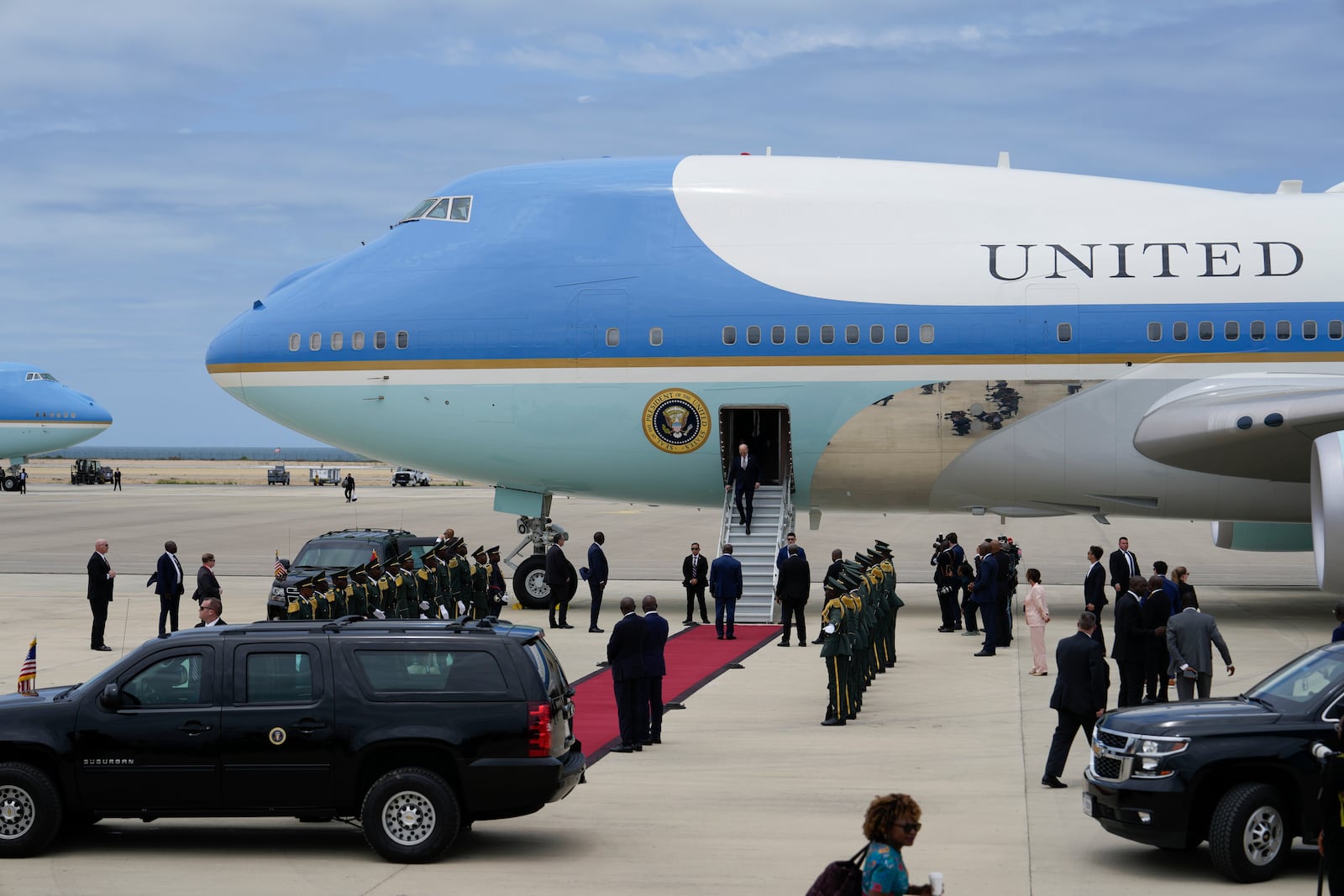 President Joe Biden disembarks Air Force One after arriving at Catumbela airport in Angola on Wednesday, Dec. 4, 2024. (AP Photo/Ben Curtis)