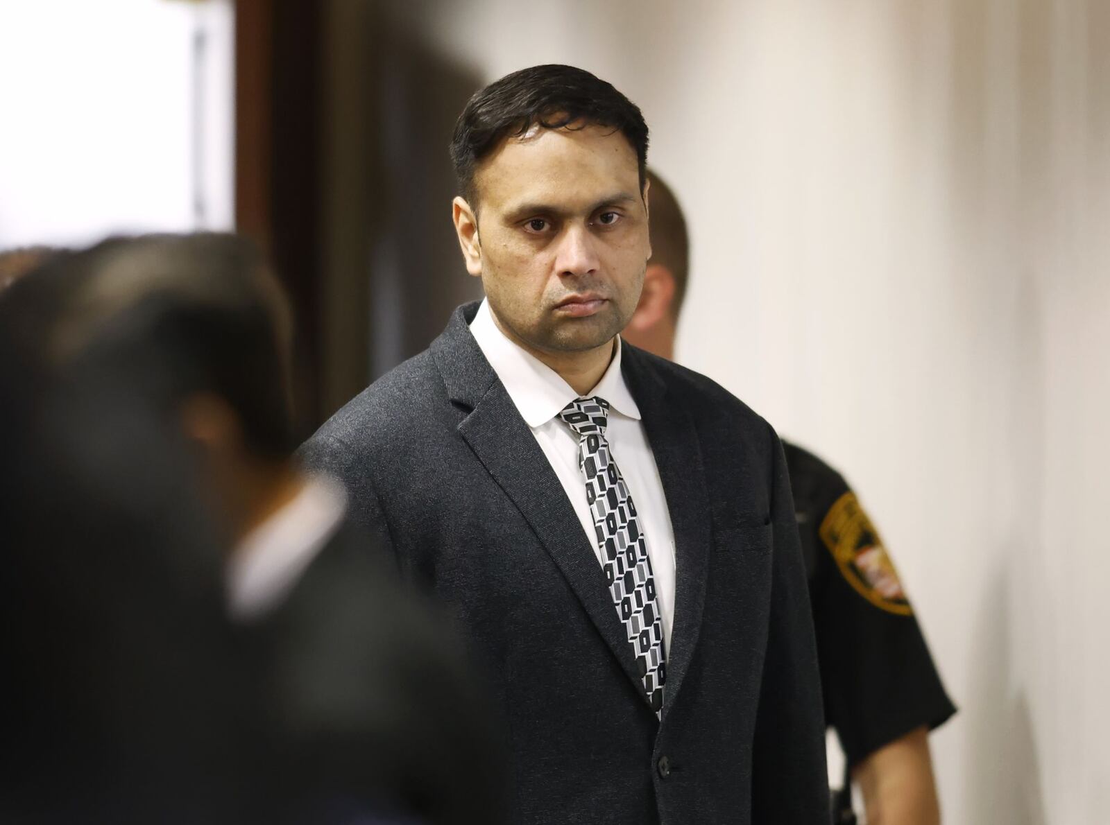 Gurpreet Singh enters the courtroom in the afternoon as opening statements got under way in his death penalty homicide trial Oct. 5, 2022. Singh is charged with killing his wife and three family members. NICK GRAHAM/STAFF