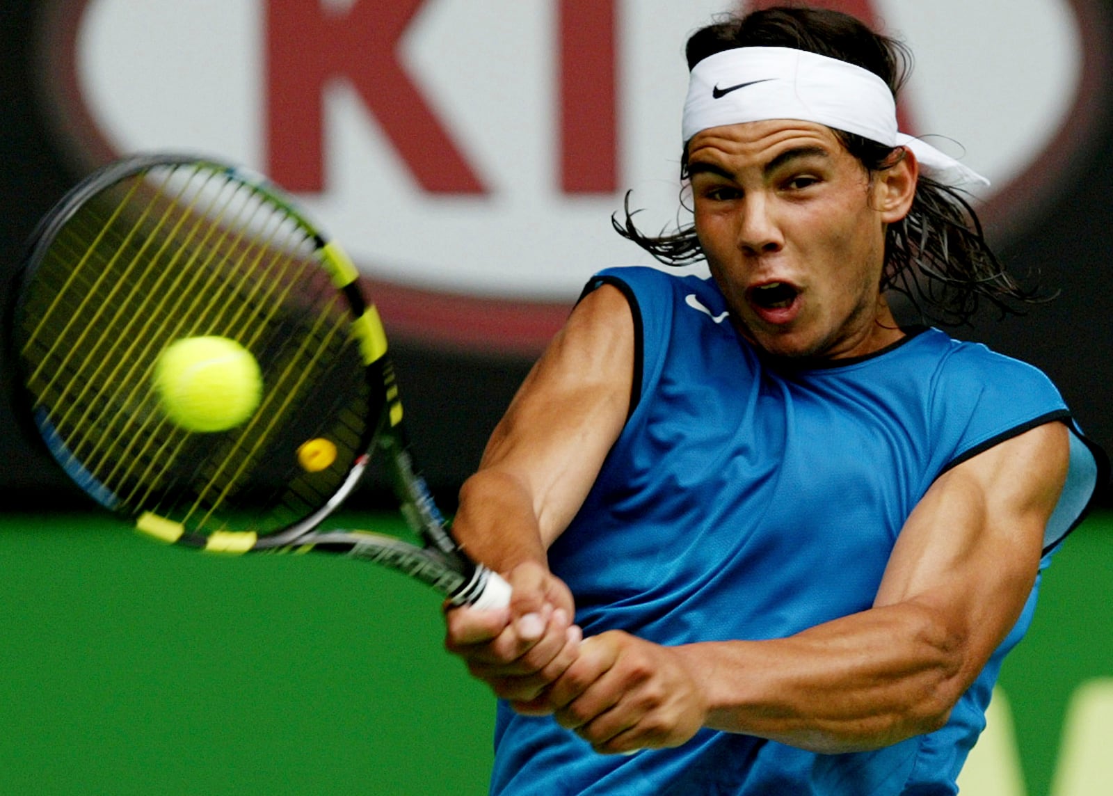 FILE - Spain's Rafael Nadal makes a backhand return during his second round win over Russia's Mikhail Youzhny at the Australian Open at Melbourne Park, Melbourne, Australia, Thursday, Jan. 20, 2005. (AP Photo/Rick Stevens, File)