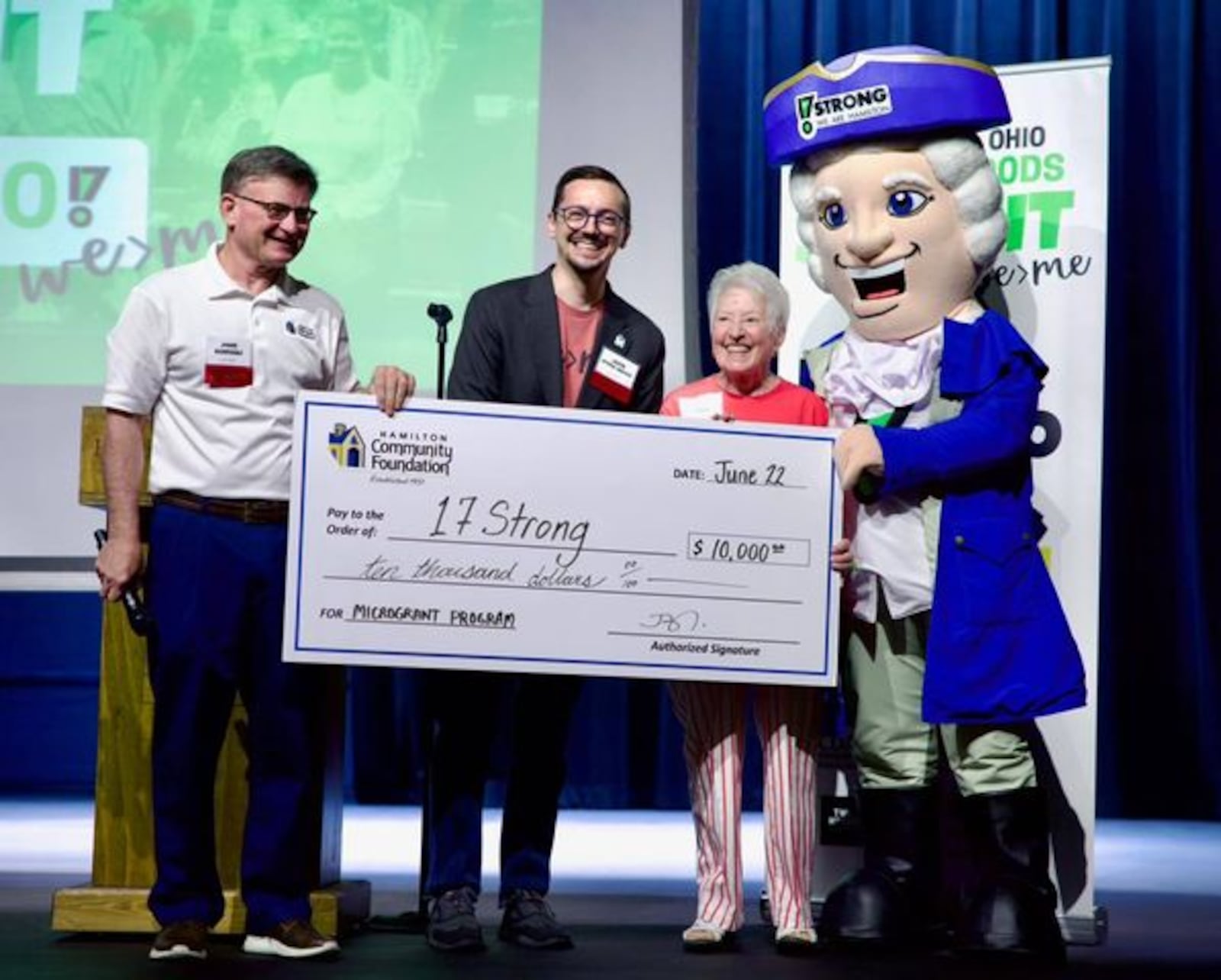 Friends of 17Strong received a $10,000 contribution from the Hamilton Community Foundation on June 22 at the 17Strong Hamilton Neighborhoods Summit. 17Strong Board Chair Kathleen Klink received the check from Hamilton Community Foundation President John Guidugli