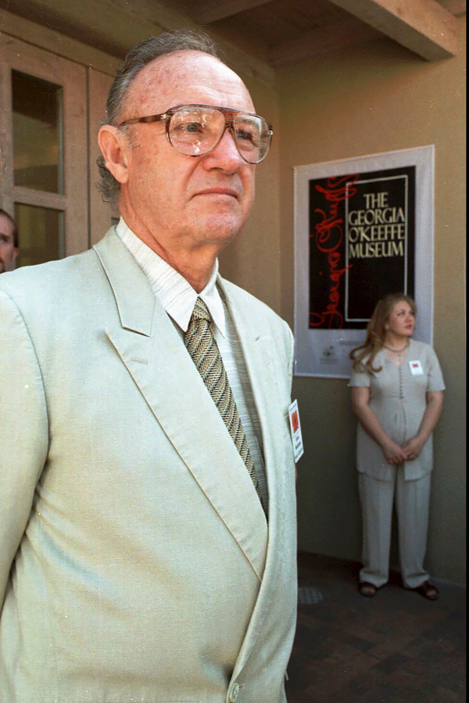 FILE - Actor Gene Hackman waits backstage at the opening of the new O'Keeffe Museum, July 17, 1997, in Santa Fe, N.M. (AP Photo/Michael Pahos, File)