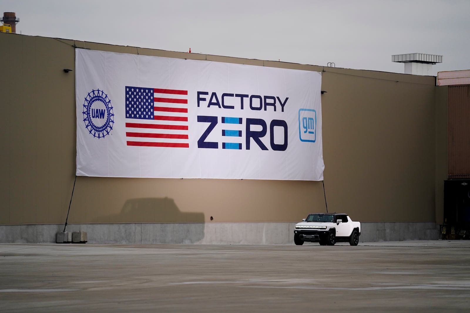 FILE - President Joe Biden test drives a Hummer at the General Motors Factory ZERO electric vehicle assembly plant during a tour, Nov. 17, 2021, in Detroit. (AP Photo/Evan Vucci, File)