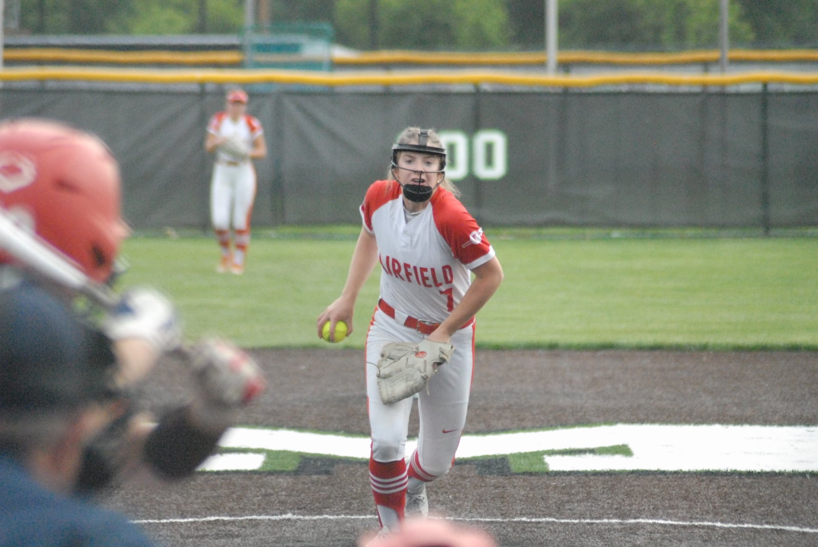 Fairfield sophomore Megan Spence prepares to send a pitch to the plate against Milford during a Division I regional semifinal on Wednesday at Mason. The Indians won 7-0. Chris Vogt/CONTRIBUTED