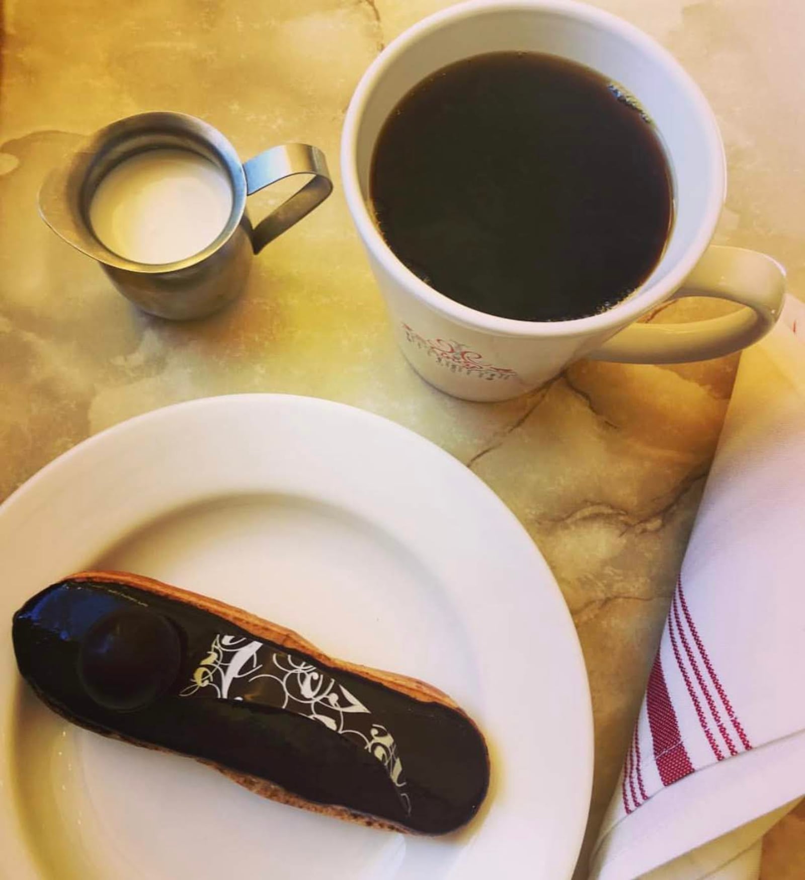 Need a taste of Paris? Visit OTR's French Crust. Enjoy an eclair and coffee at the French cafe.