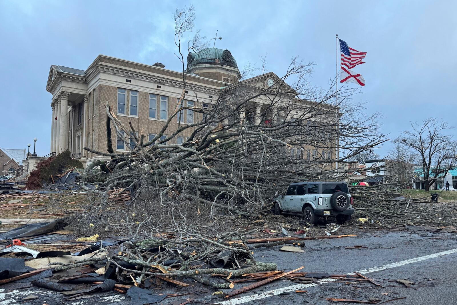 Damage from a storm through that rolled through the night before is seen at the heart of downtown on Sunday, Dec. 29, 2024, in Athens, Ala. (AP Photo/Lance George)