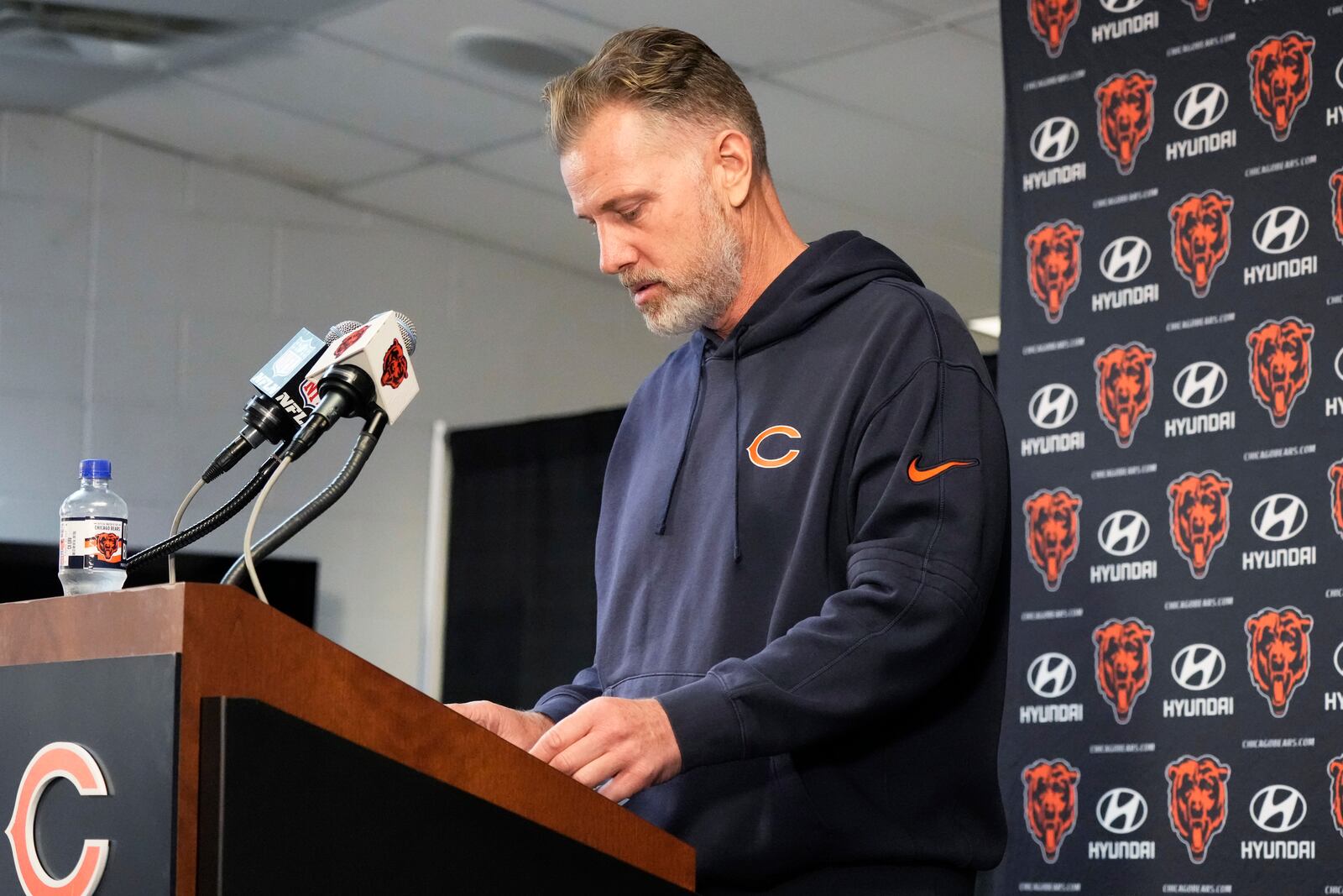 Chicago Bears head coach Matt Eberflus looks down as he talks to reporters during a news conference after an NFL football game against the Green Bay Packers in Chicago, Sunday, Nov. 17, 2024. (AP Photo/Nam Y. Huh)