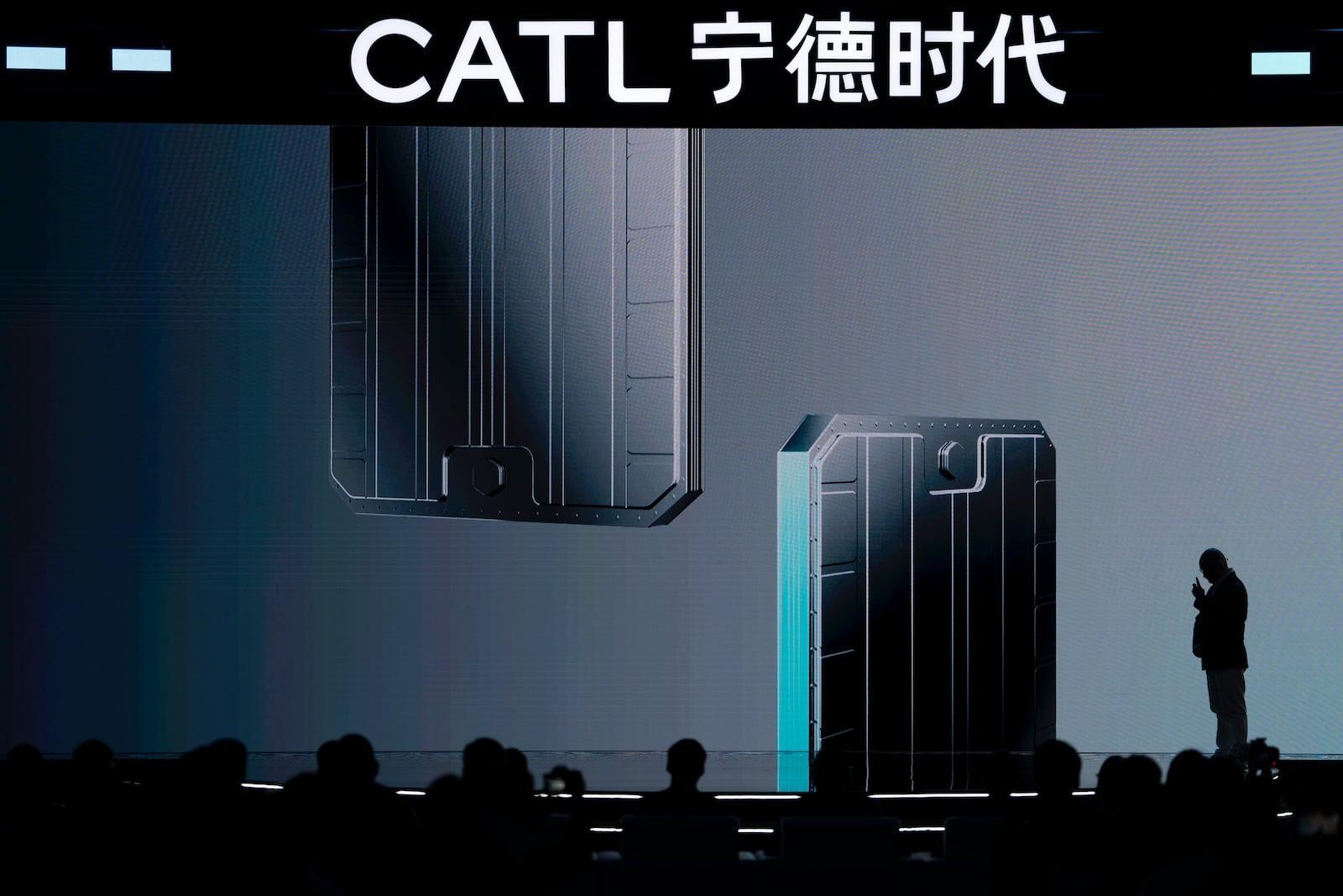 The next generation swap battery build by China-based CATL battery manufacturing company, is shown on the screen during a launch presentation in Xiamen, Fujian province, China, Wednesday, Dec. 18, 2024. (AP Photo/Ng Han Guan)