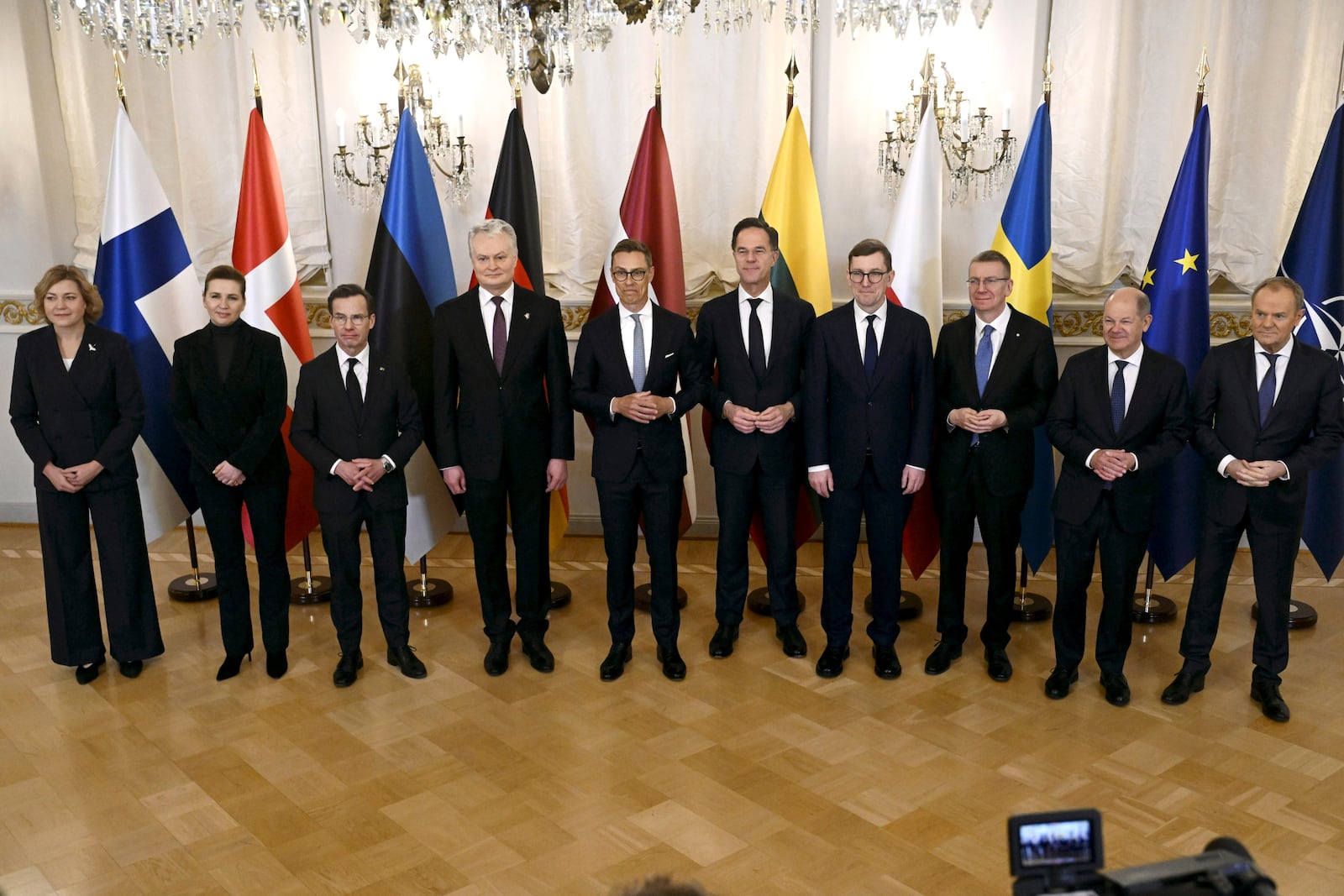 From left, EU Executive Vice-President for Tech Sovereignty, Security and Democracy Henna Virkkunen, Danish Prime Minister Mette Frederiksen, Swedish Prime Minister Ulf Kristersson, the President of Lithuania, Gitanas Nauseda, Finnish President Alexander Stubb, Nato Secretary General Mark Rutte, Estonian Prime Minister Kristen Michal, Latvian President Edgars Rinkevics, German Chancellor Olaf Scholz and Poland's Prime Minister Olaf Tusk pose for a photo before a summit of the Baltic Sea NATO countries in Helsinki, Finland, Tuesday, Jan. 14, 2025. (Antti Aimo-Koivisto/Lehtikuva via AP)