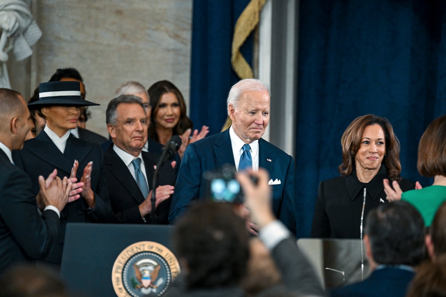 President Joe Biden and Vice President Kamala Harris arrive before the inauguration of Donald Trump as the 47th president in the Rotunda at the Capitol in Washington on Monday morning, Jan. 20, 2025. (Kenny Holston/The New York Times)