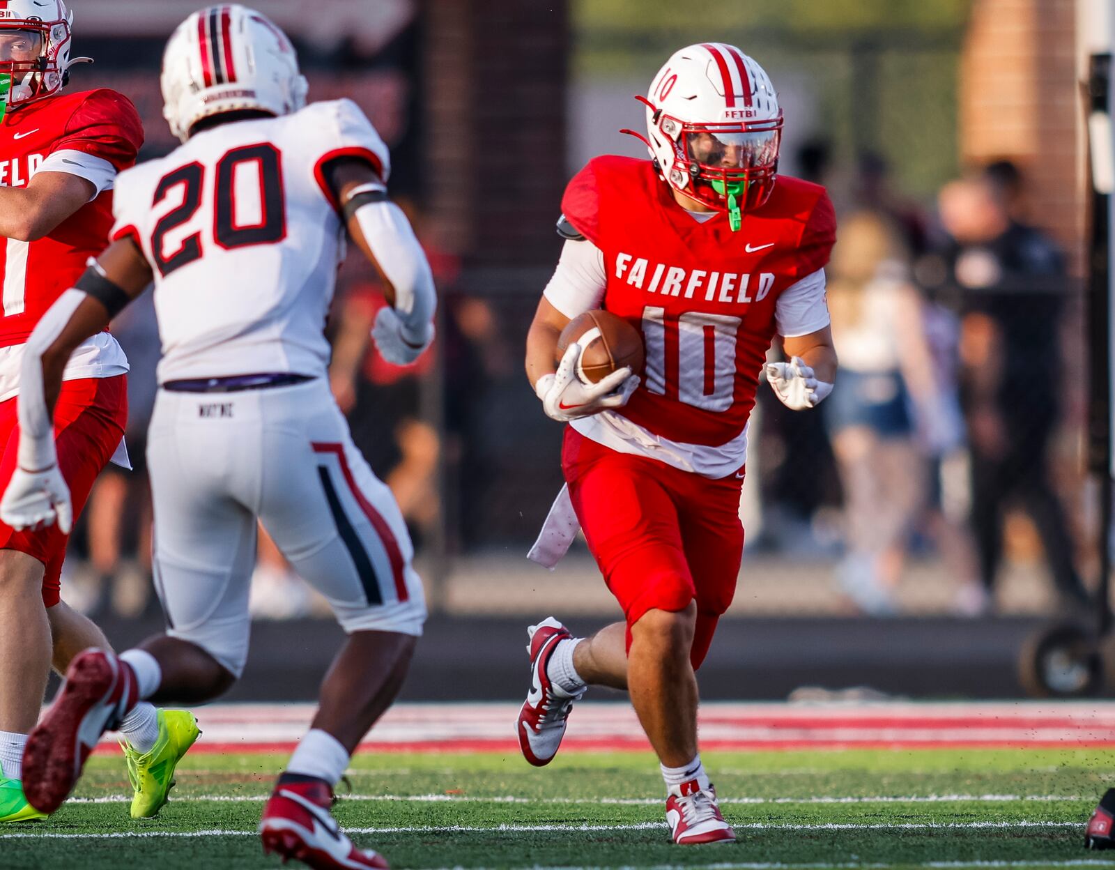 Fairfield's Tyler George carries the ball during their game against Wayne. Wayne defeated Fairfield 31-13 on opening night of high school football Friday, Aug. 23, 2024 at Fairfield Alumni Stadium. NICK GRAHAM/STAFF