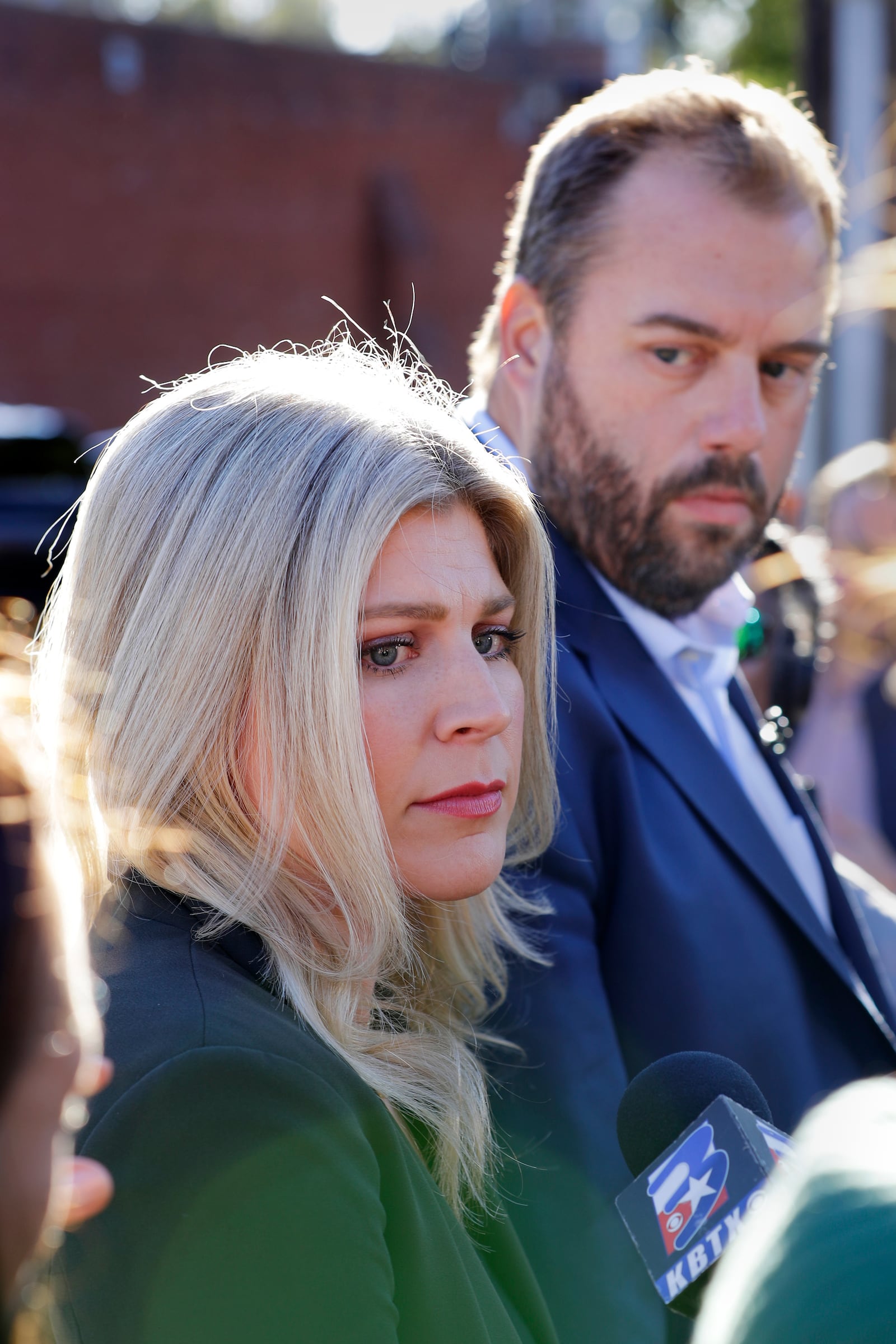 Texas state representatives Lacey Hull, left, and John Bucy III, speak to reporters on the pending execution of Robert Roberson during an impromptu press conference outside of the Huntsville Unit of the Texas State Penitentiary, Thursday, Oct. 17, 2024, in Huntsville, Texas. (AP Photo/Michael Wyke)