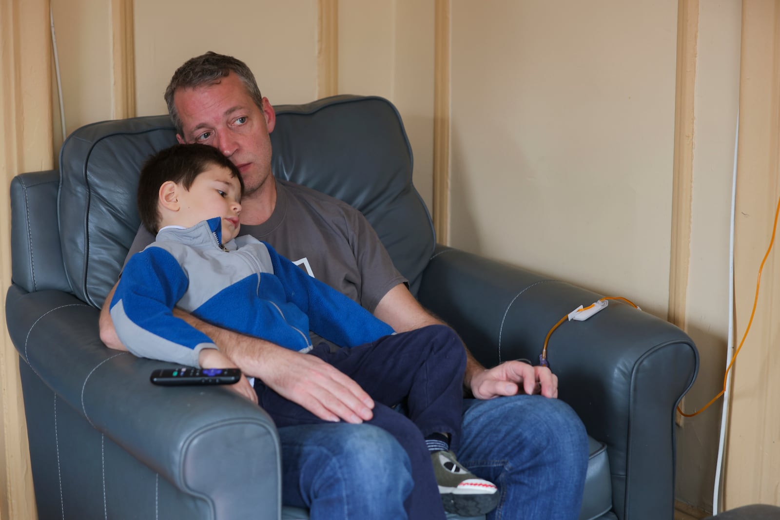 Jake Heinrichs sits with his 3-year-old son, Sam, during his infusion treatment with an experimental anti-amyloid Alzheimer's drug in New York, on Wednesday, March 12, 2025. (AP Photo/Heather Khalifa)