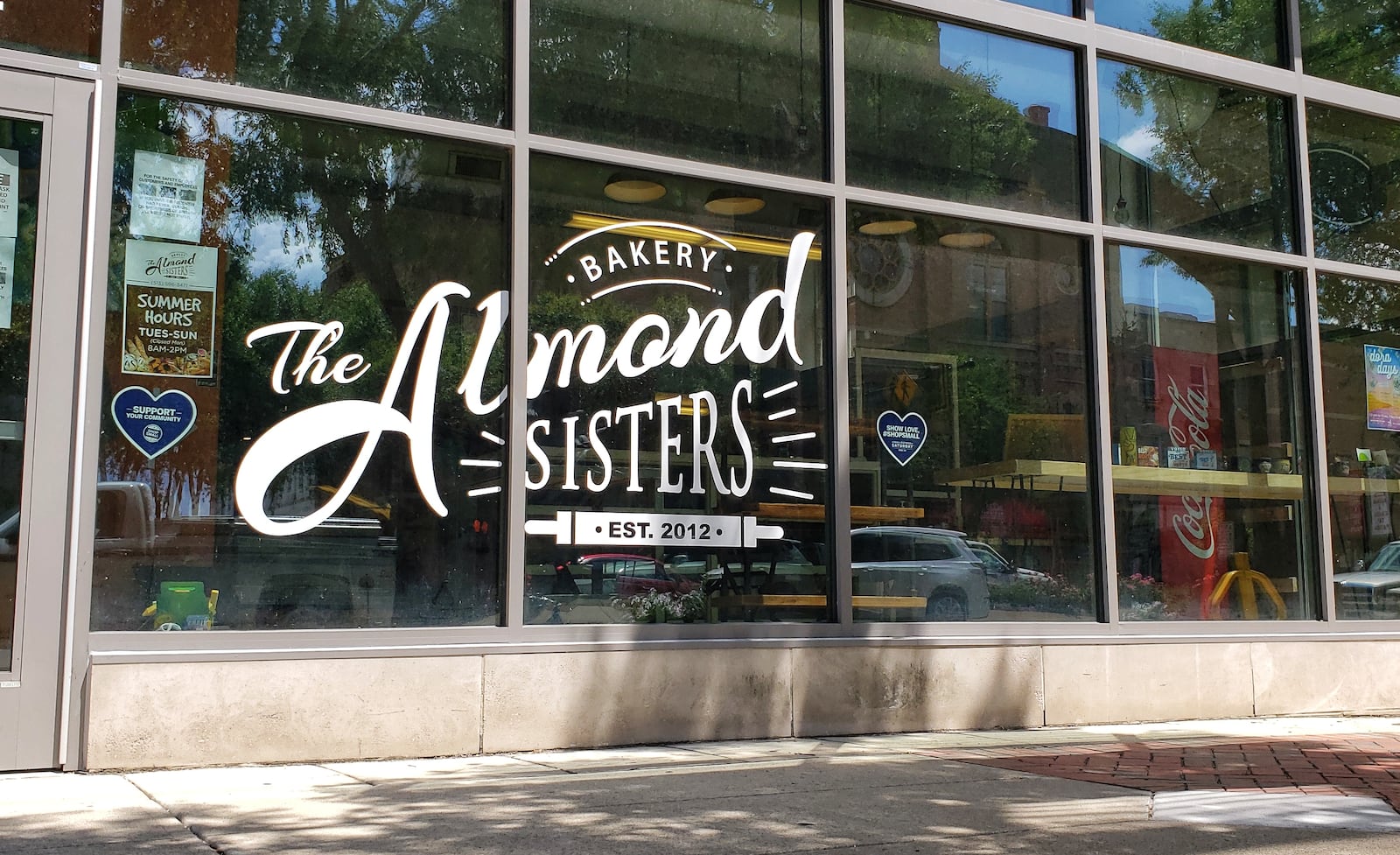 Almond Sisters Bakery on High Street in Hamilton has seen support from the community and other local businesses to help them out after one of their windows was broken out over the weekend. NICK GRAHAM / STAFF