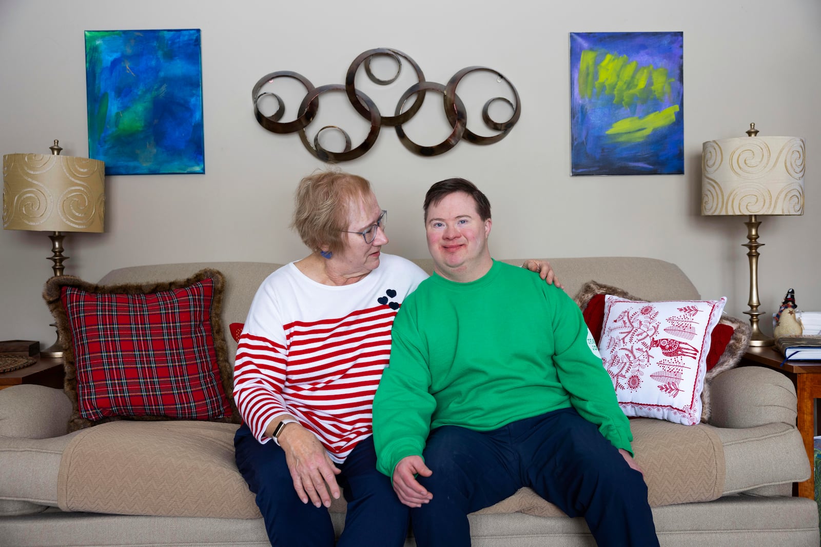 Paul Safarik, 32, sits with his mother, Deb, on Wednesday, Feb. 12, 2025, in Lincoln, Neb. (AP Photo/Rebecca S. Gratz)