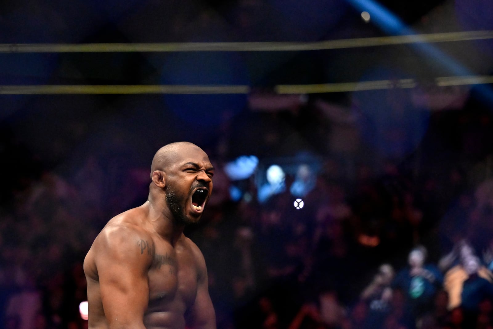 FILE - Jon Jones reacts after his victory over Ciryl Gane in a UFC 285 mixed martial arts heavyweight title bout Saturday, March 4, 2023, in Las Vegas. (AP Photo/David Becker, File)