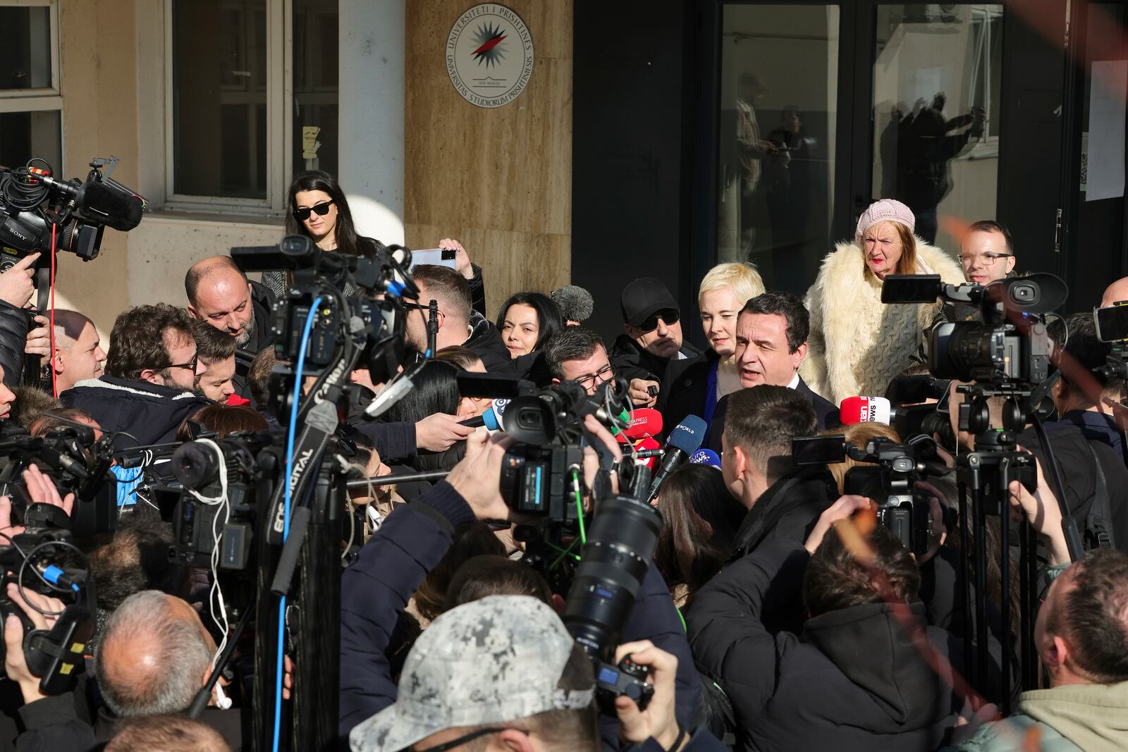 Albin Kurti, President of the left-wing Vetevendosje! party, makes statements outside a voting station as Kosovo holds a parliamentary election in Pristina, Kosovo, Sunday, Feb. 9, 2025. (AP Photo/Vlasov Sulaj)