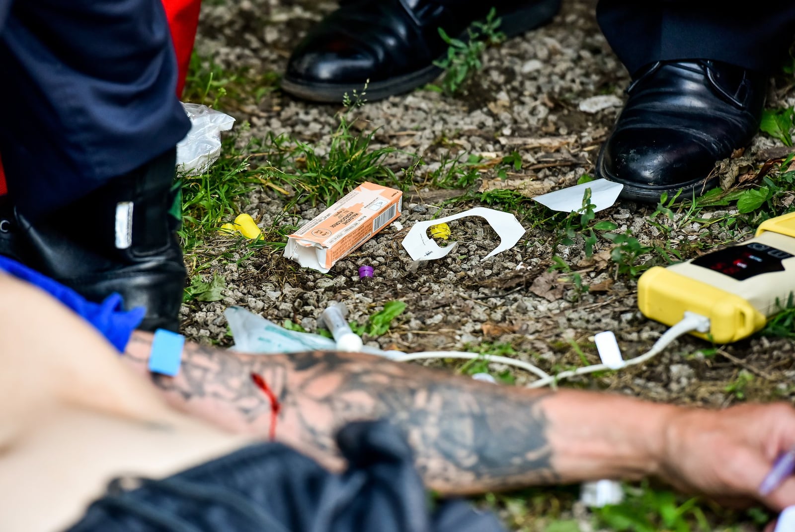 Middletown paramedics and police officers respond to a drug overdose in June 2017. STAFF FILE PHOTO