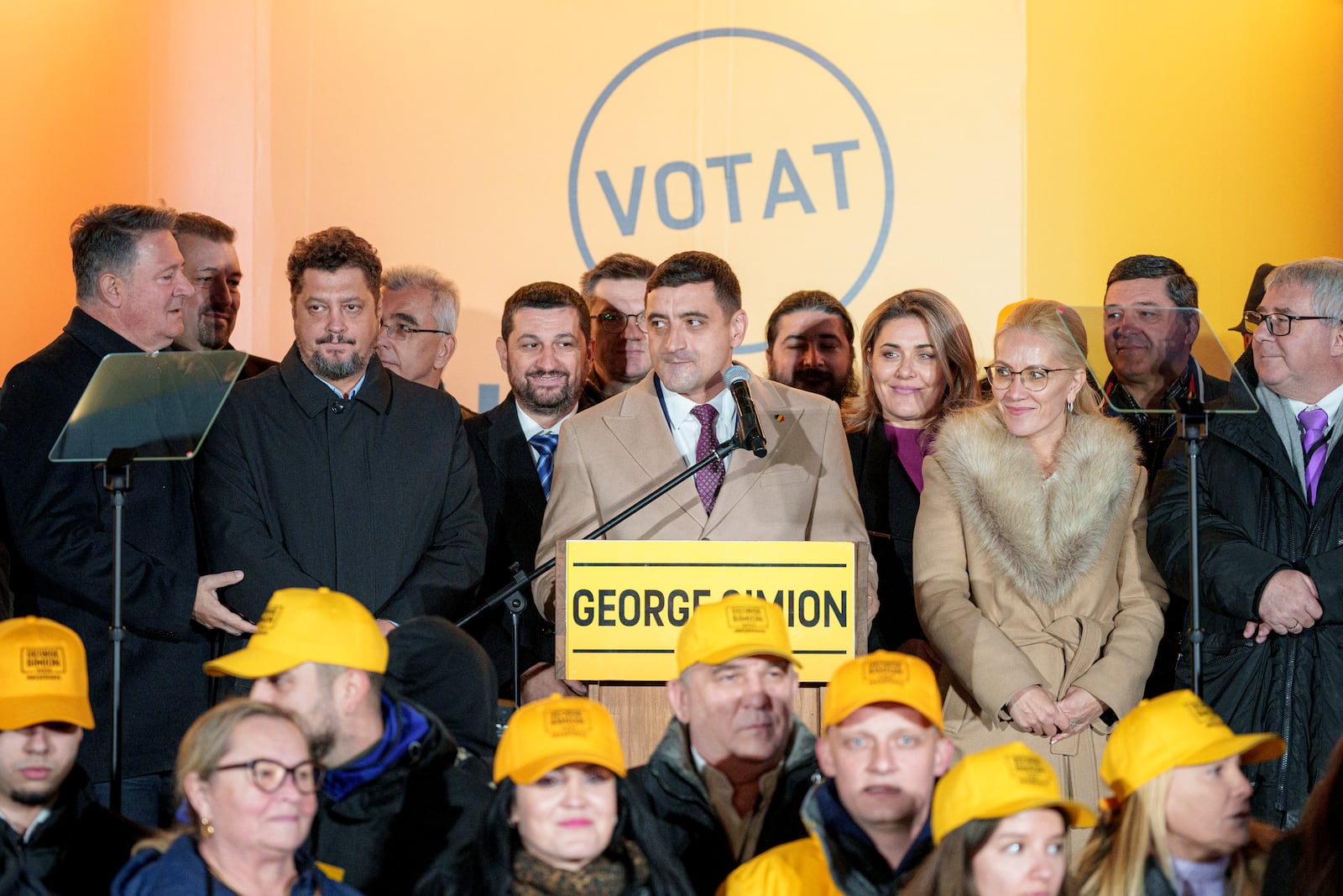 George Simion, the Alliance for the Unity of Romanians (AUR) candidate for president speaks to media after polls closed during the country's presidential elections, in Bucharest, Romania, Sunday, Nov. 24, 2024. (AP Photo/Andreea Alexandru)