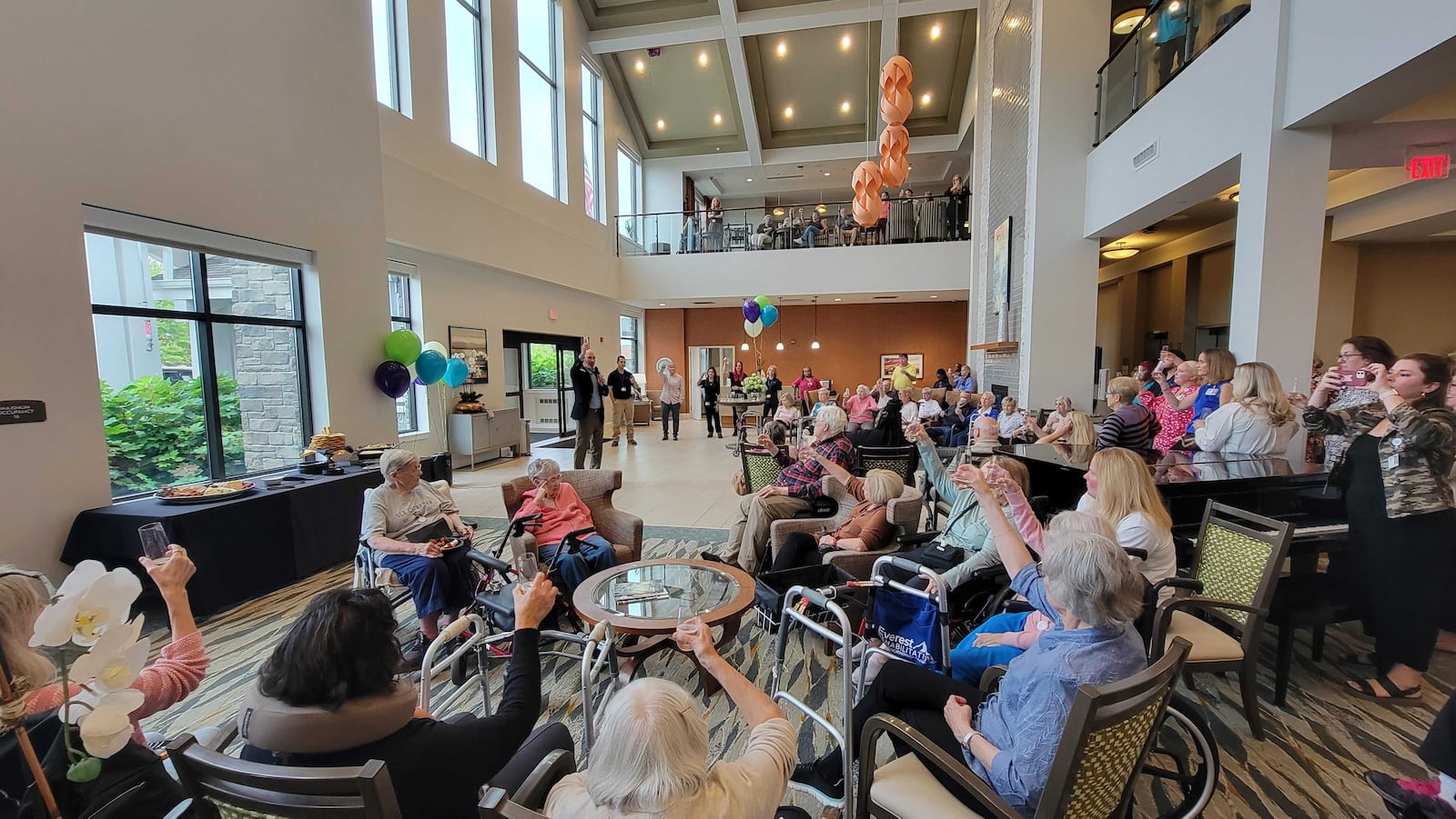 Community First Solutions in Butler County expands its regional senior living footprint, acquiring Anthology of Mason from Anthology Senior Living. The facility, which is renamed Montage Mason, serves the Mason and Deerfield Twp. communities. The purchase was announced Wednesday to residents, family members, and employees of the newly renamed Montage Mason. Pictured is Community First Solutions President and CEO Brett Kirkpatrick hosting a celebratory toast in the Montage Mason lobby on Wednesday. PROVIDED