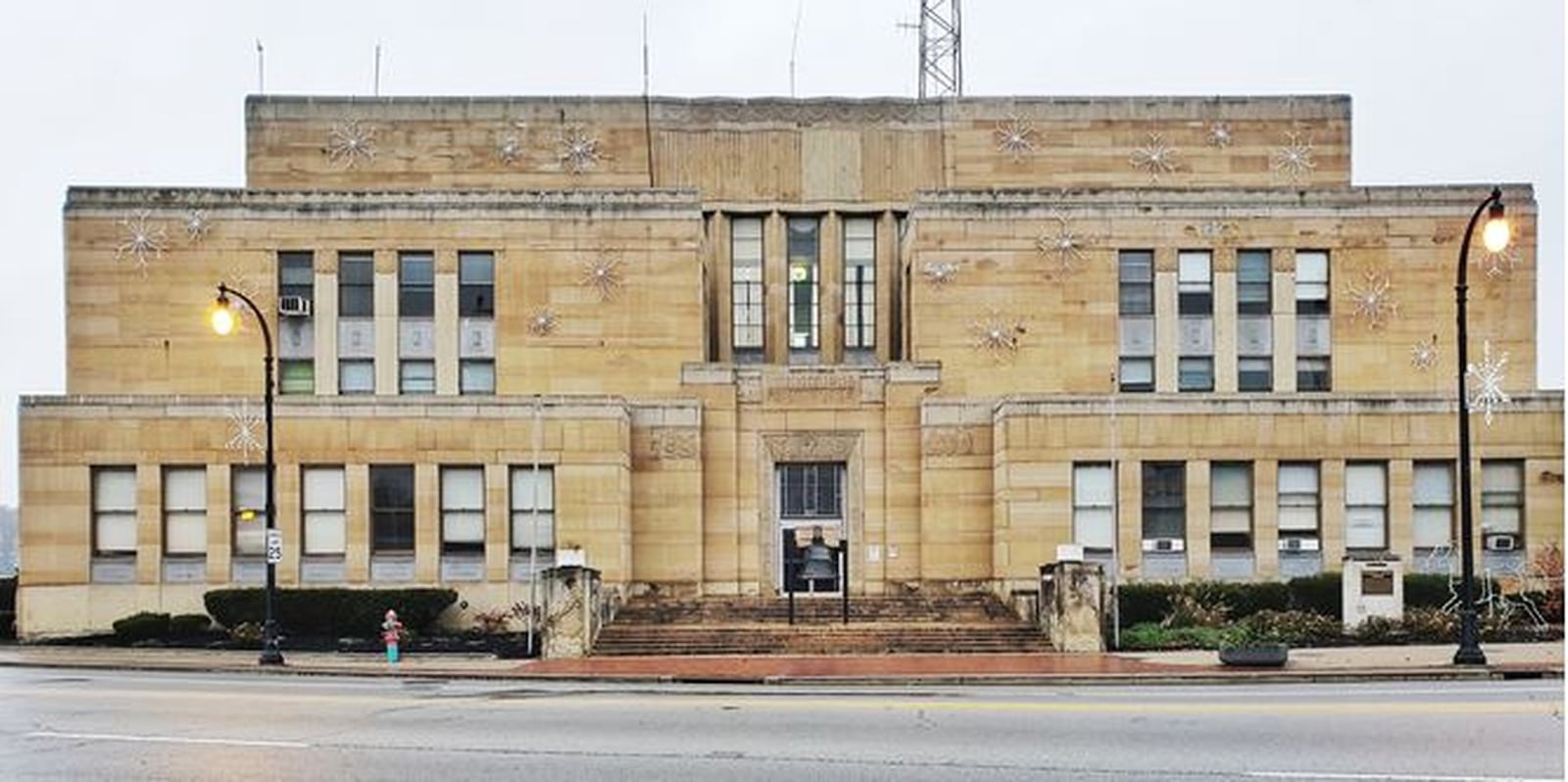 The former Hamilton municipal building at 20 High St. may be developed into 50 market-rate apartments by the developer who is creating The Marcum complex of apartments, restaurants and retail shops. NICK GRAHAM/STAFF