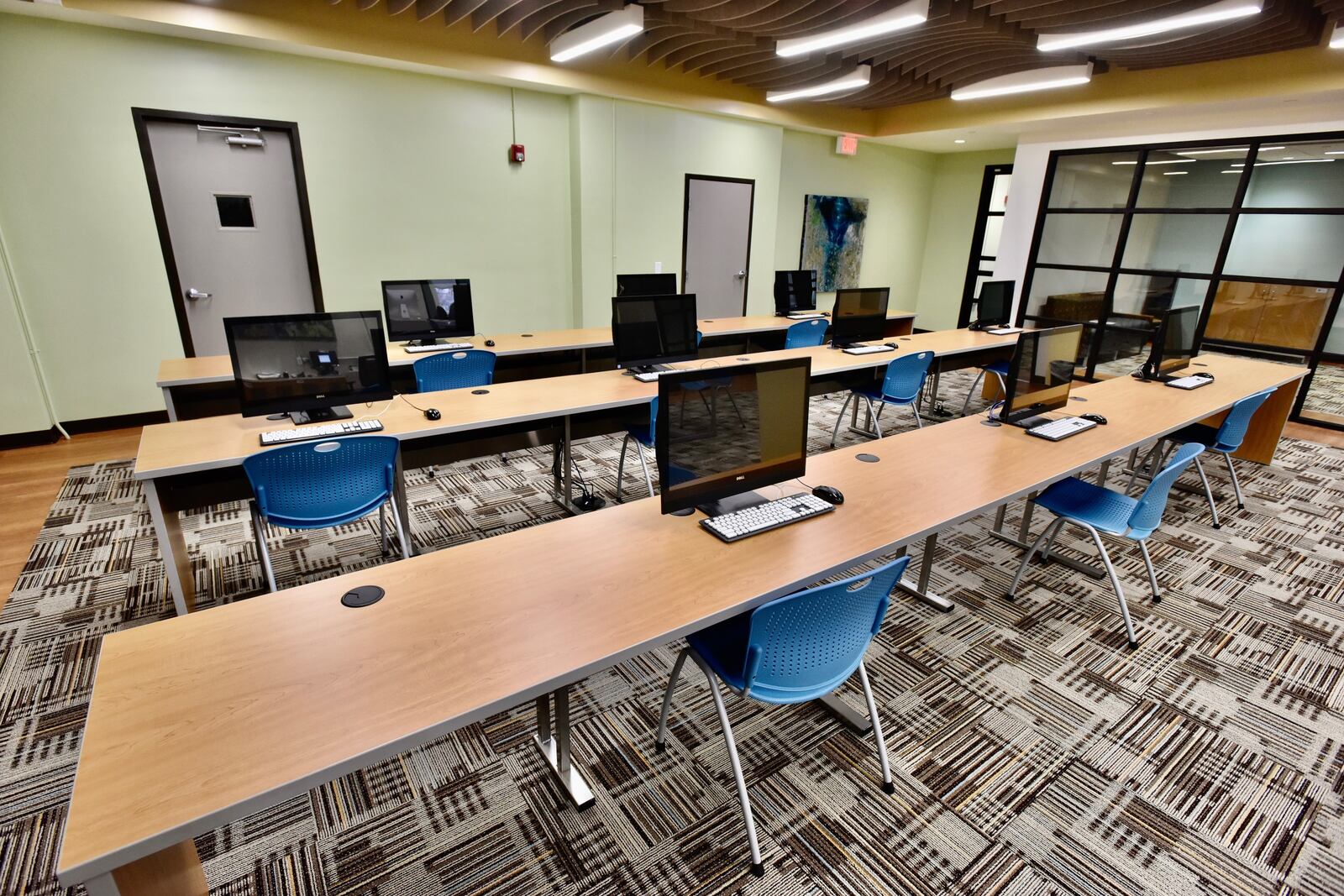 A new technology center, operated by Lane Library, has opened in the former Hamilton Journal-News building. . NICK GRAHAM/STAFF