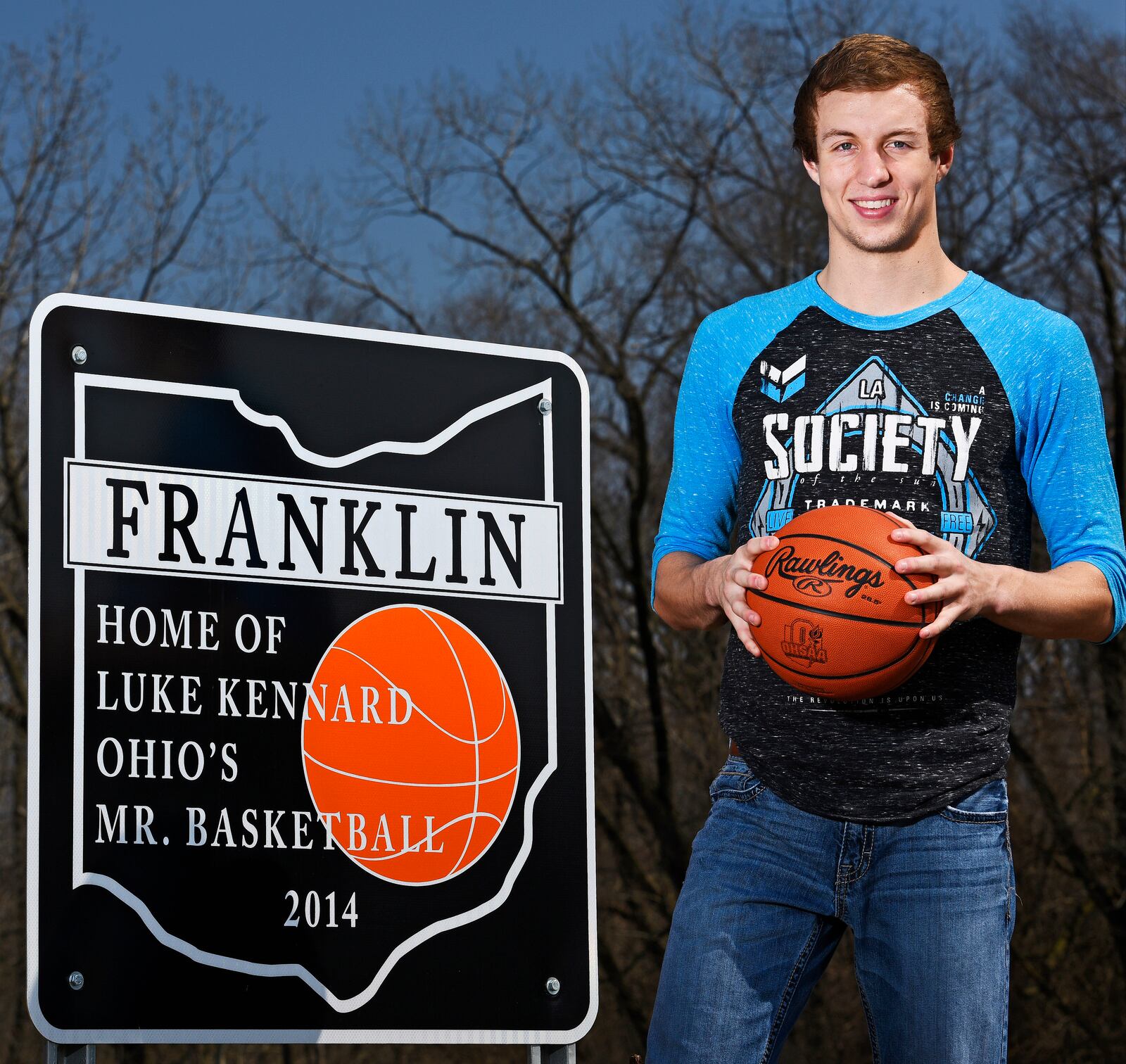 In this 2015 file photo, Franklin’s Luke Kennard stands next to one of the signs that have been installed on roads entering the city. 