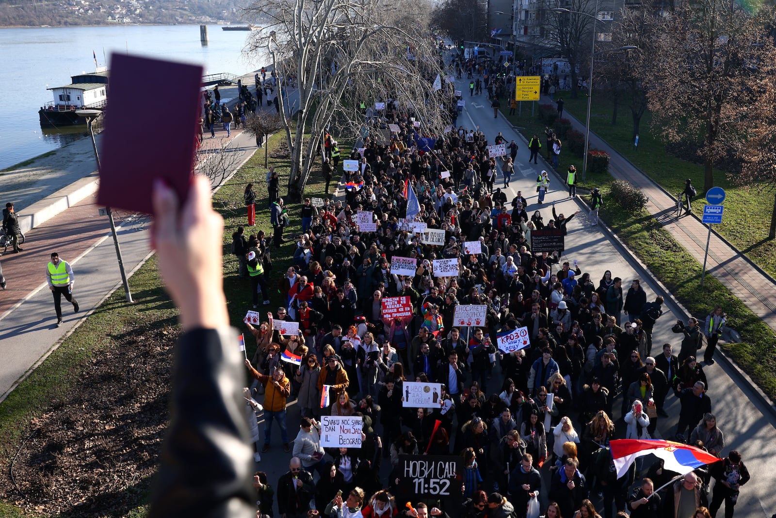 People march during a protest over the collapse of a concrete canopy that killed 15 people more than two months ago, in Novi Sad, Serbia, Saturday, Feb. 1, 2025. (AP Photo/Armin Durgut)