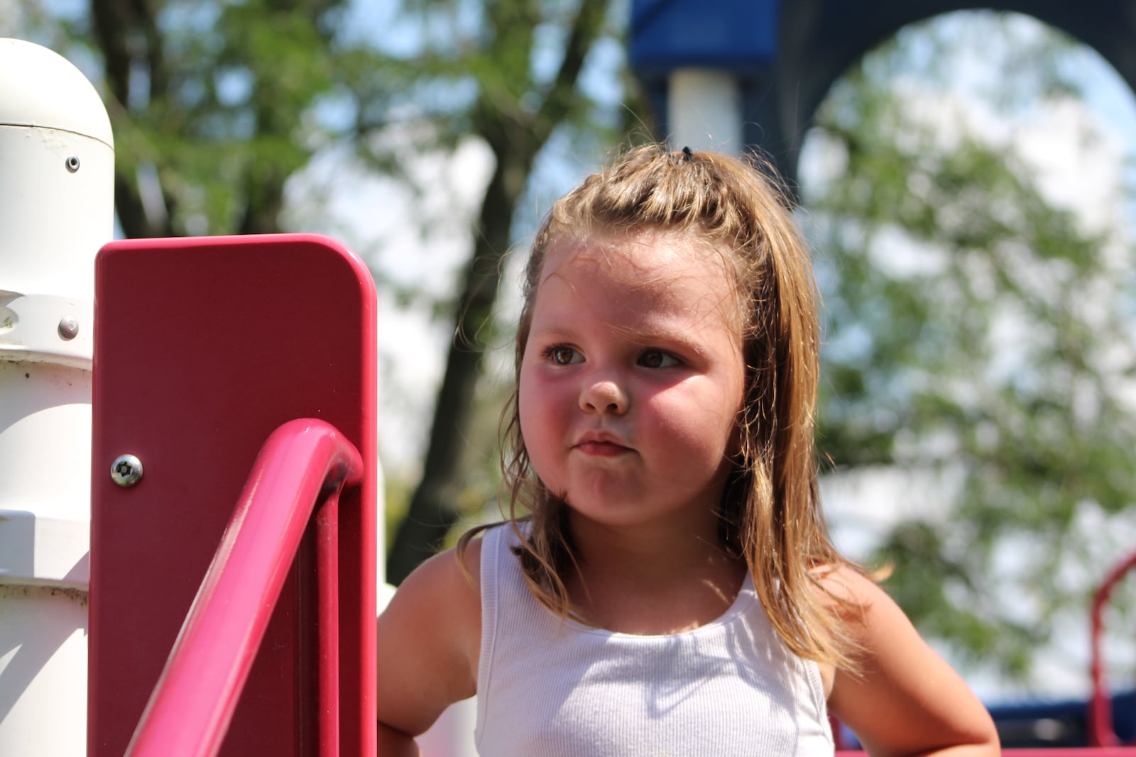 Four-year-old Aumora Whitson plays at Island MetroPark in Dayton. Aumora's mother, Hayley Ratliff, has received advance child tax credit payments but worries they could impact her taxes next year. CORNELIUS FROLIK / STAFF