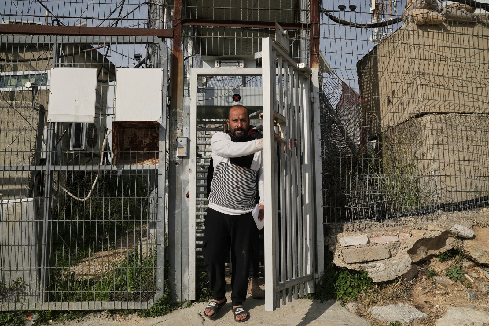 Hamdan Ballal, Oscar-winning Palestinian director of "No Other Land," is released from a police station in the West Bank settlement of Kiryat Arba a day after being detained by the Israeli army following an attack by Jewish settlers, March 25, 2025. (AP Photo/Leo Correa)