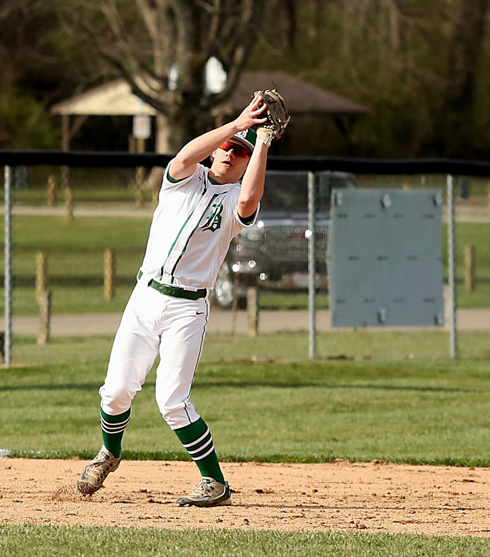 Badin third baseman Zac Wilson catches a Defiance popup during Wednesday’s game at Alumni Field in Hamilton. CONTRIBUTED PHOTO BY E.L. HUBBARD