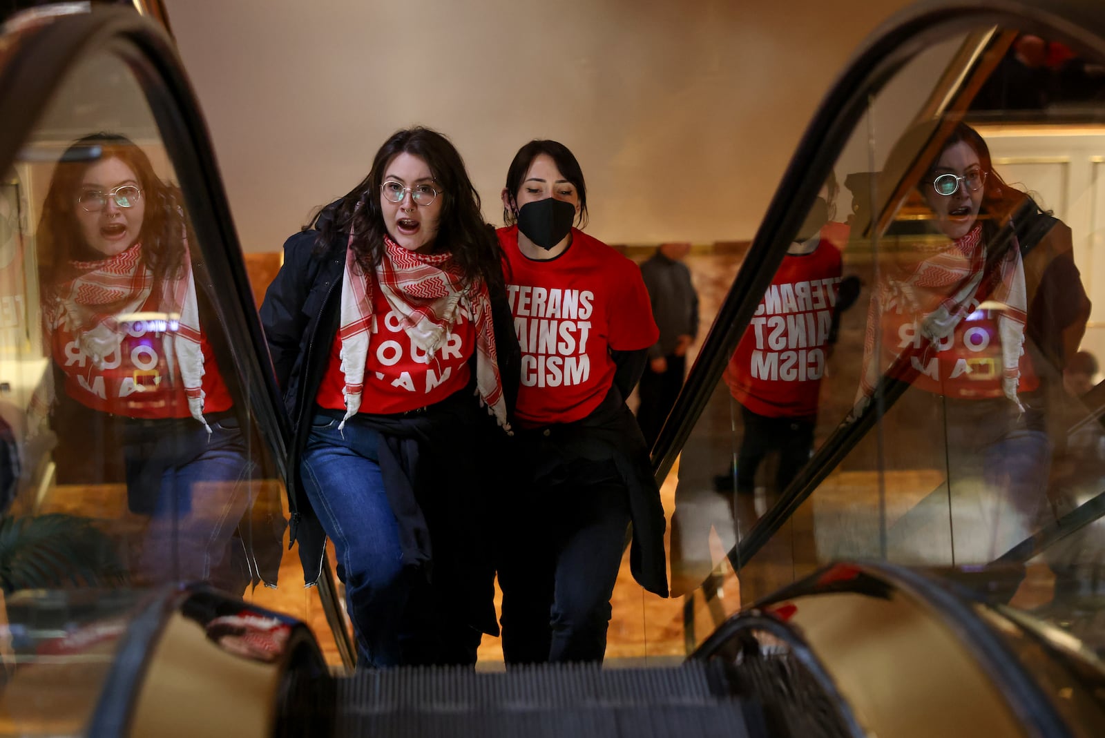 Demonstrators from the group, Jewish Voice for Peace, are escorted out after they were arrested while protesting inside Trump Tower in support of Columbia graduate student Mahmoud Khalil, Thursday, March 13, 2025, in New York. (AP Photo/Yuki Iwamura)