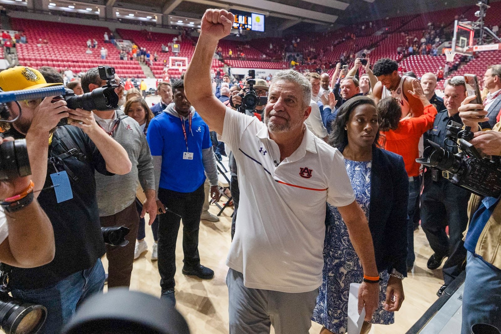 Auburn head coach Bruce Pearl celebrates after a win over Alabama at an NCAA college basketball game, Saturday, Feb. 15, 2025, in Tuscaloosa, Ala. (AP Photo/Vasha Hunt)