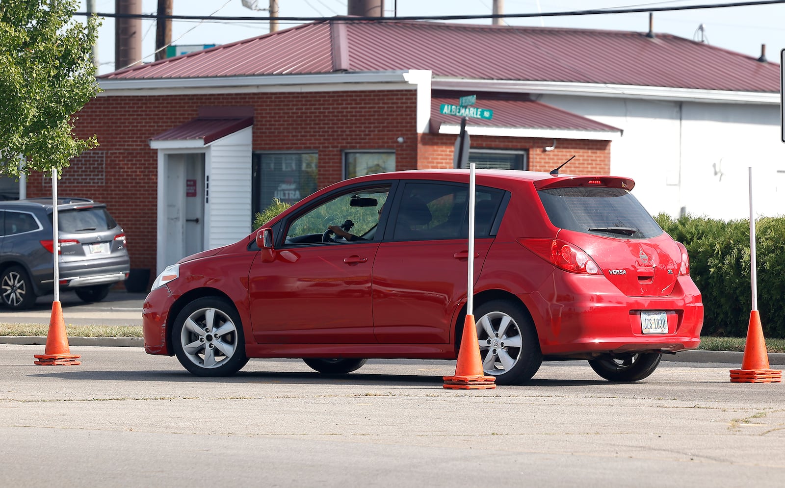 A driver goes through the maneuverability test in the parking lot of the Park Shopping Center Thursday, Sept. 21, 2023. BILL LACKEY/STAFF