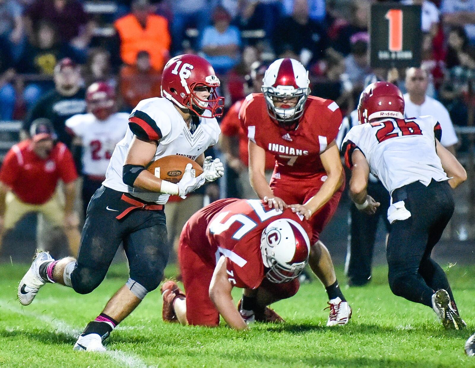 Madison’s Tyler Baumgartner carries the ball during Friday night’s game against Carlisle at Laughlin Field in Carlisle. NICK GRAHAM/STAFF