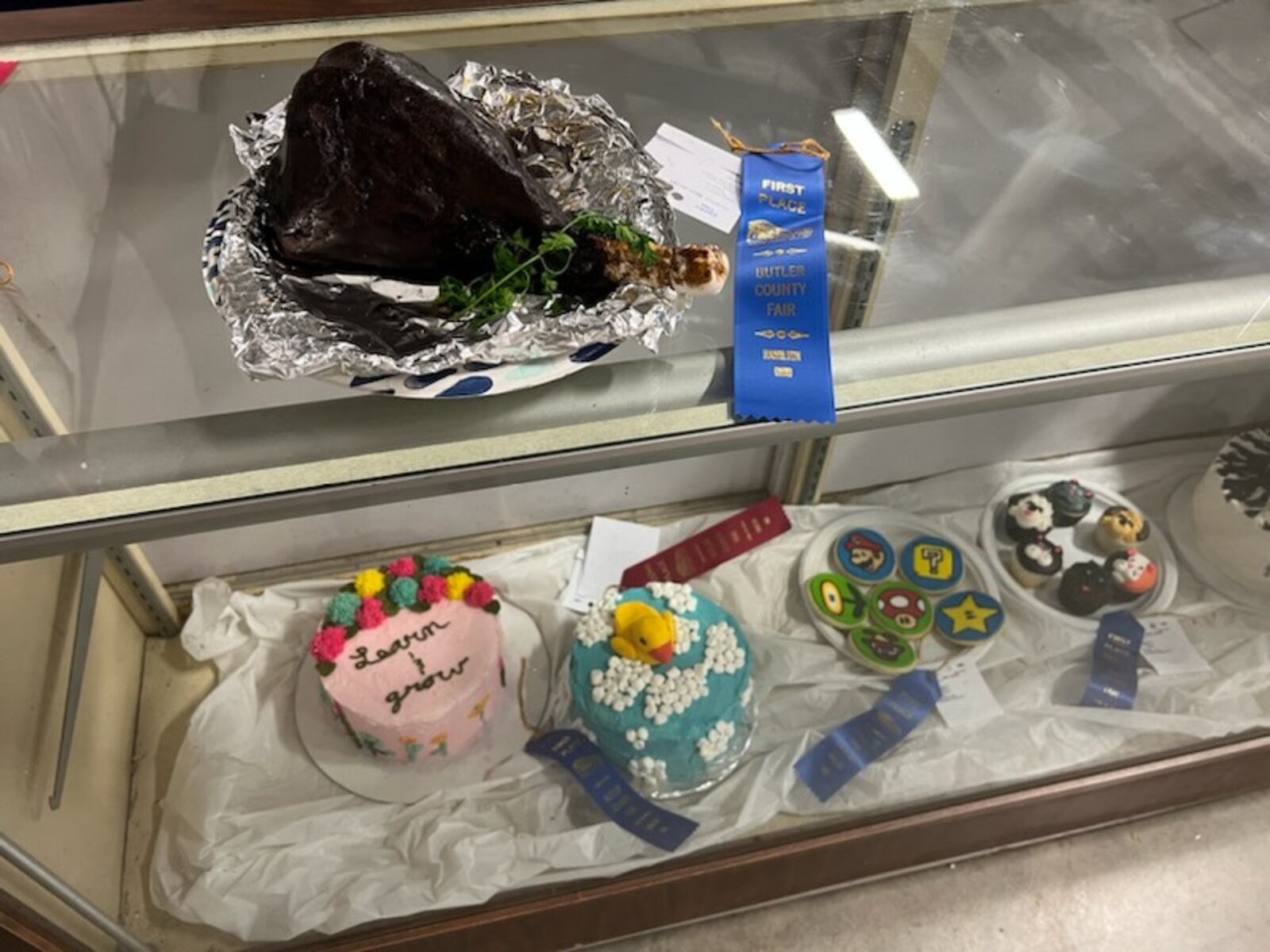 Pictured is the First Place winner from Audrey Brown of Lebanon, in the Decorated Cakes, Fair Food theme Open Class division. The fair will be held through Saturday in Hamilton. AMY BURZYNSKI/STAFF