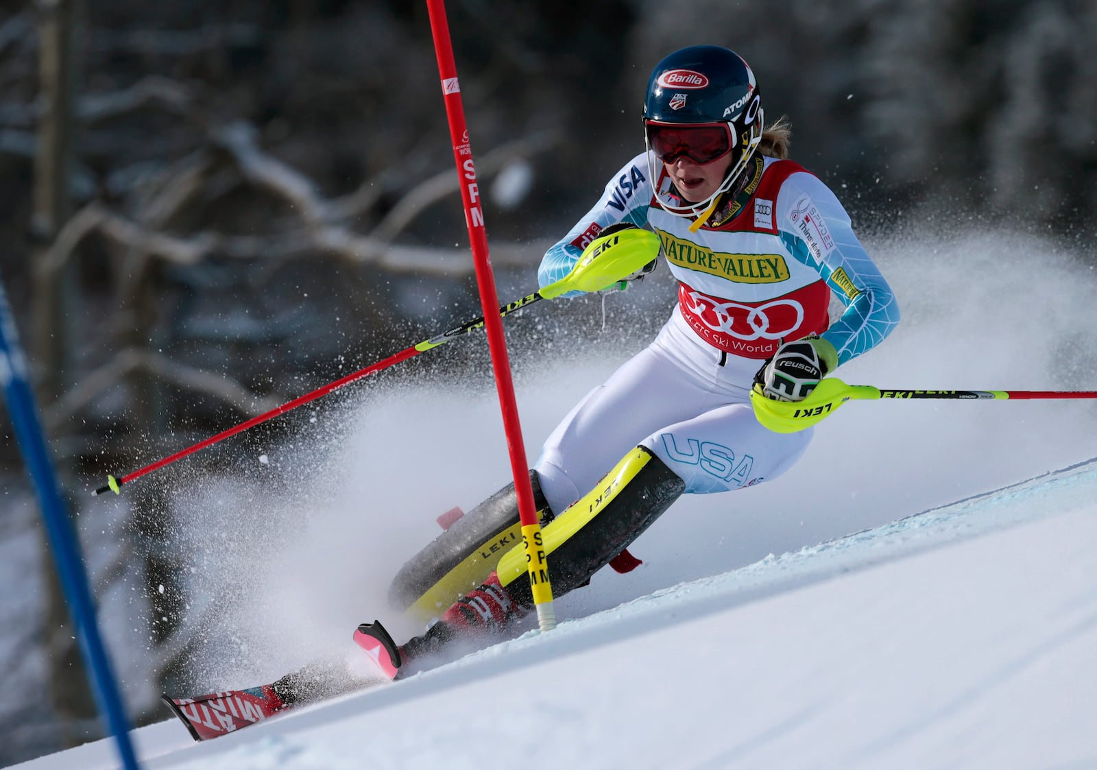 FILE - United States' Mikaela Shiffrin speeds down the course during the women's World Cup slalom ski race Saturday, Nov. 28, 2015, in Aspen, Colo. (AP Photo/Nathan Bilow, File)