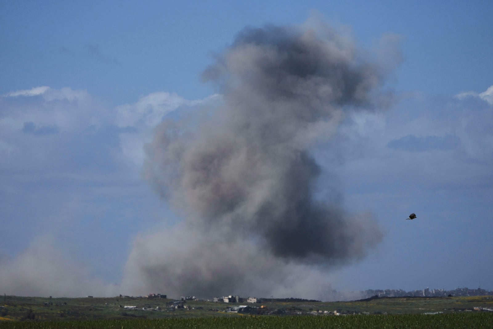 Smoke rises following an Israeli bombardment in the Gaza Strip, as seen from southern Israel, Wednesday, March 19, 2025. (AP Photo/Ariel Schalit)